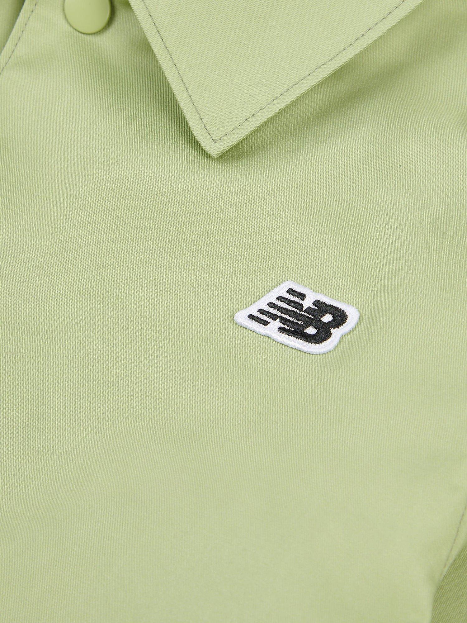 Product image 10 of 11, which shows New Balance Kids' Premium Water Resistant Coach Jacket, Everglade Green, 7-8 years