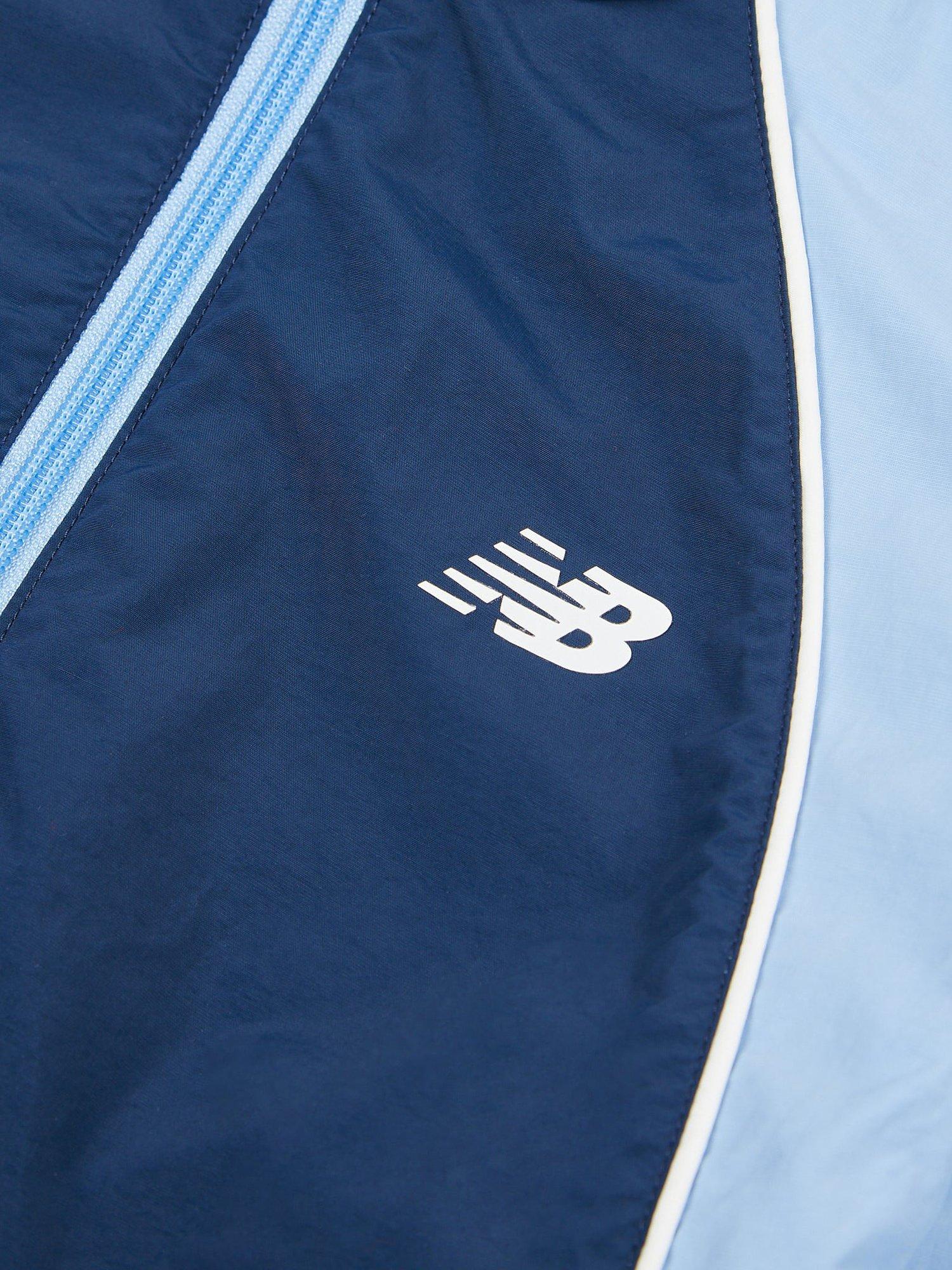 Product image 8 of 9, which shows New Balance Kids' Water Resistant Colour Block Training Jacket, Nb Navy, 7-8 years