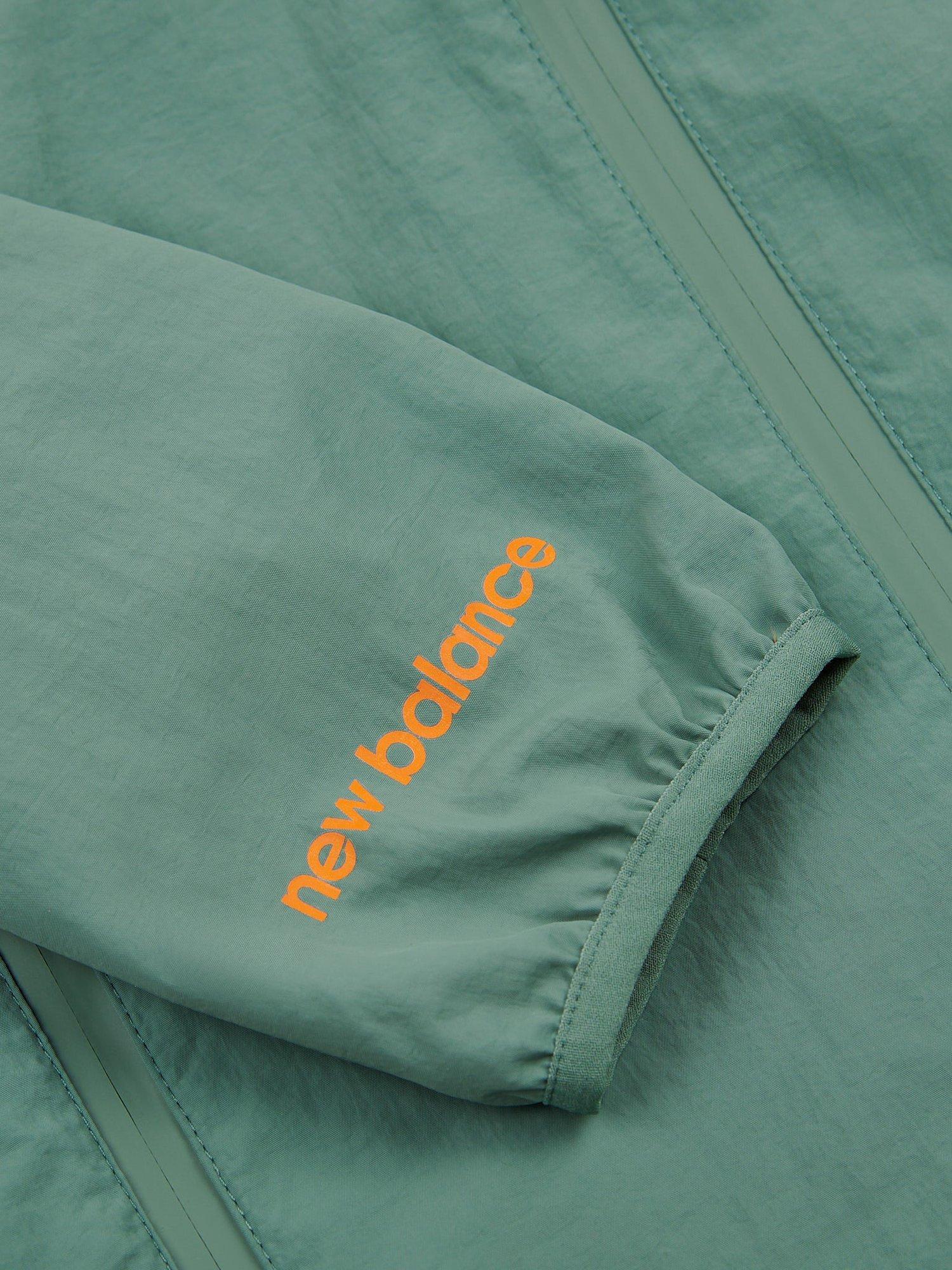Product image 10 of 10, which shows New Balance Kids' Water Resistant Light Weight Jacket, Dark Juniper, 7-8 years
