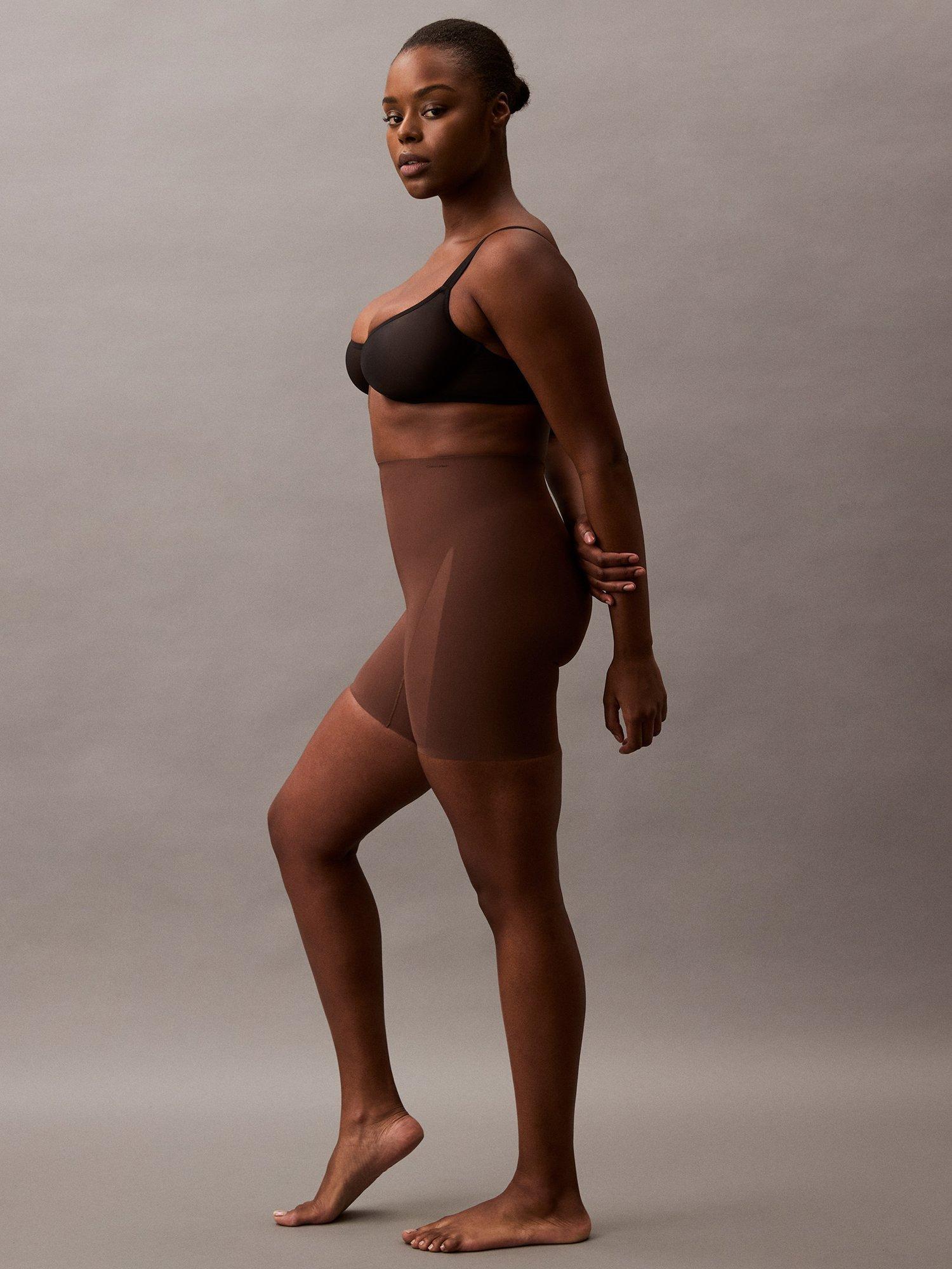 Product image 4 of 8, which shows Calvin Klein Stay-Put Mesh High Waist Shapewear Mid-Thigh Shorts, Brown Mid, S