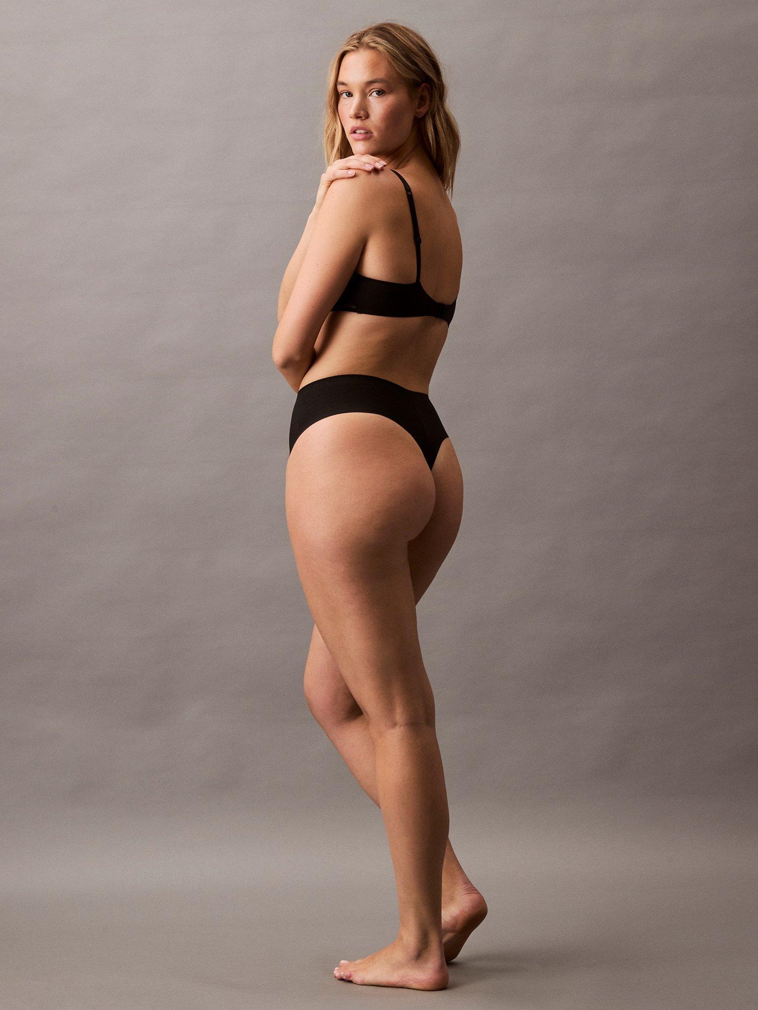 Product image 4 of 7, which shows Calvin Klein Stay-Put Mesh High Waist Shapewear Thong, Black, XS