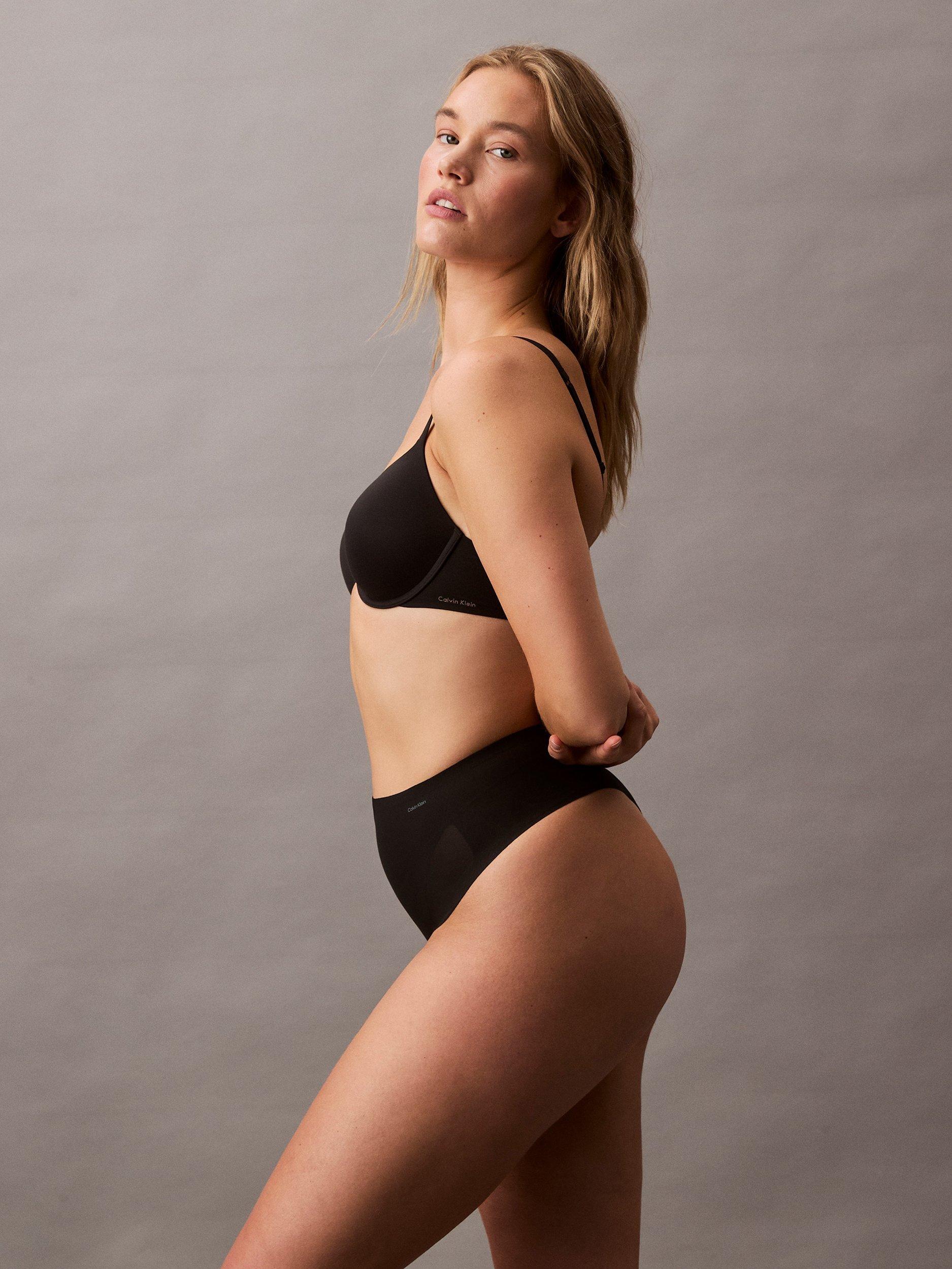 Product image 6 of 7, which shows Calvin Klein Stay-Put Mesh High Waist Shapewear Thong, Black, XS