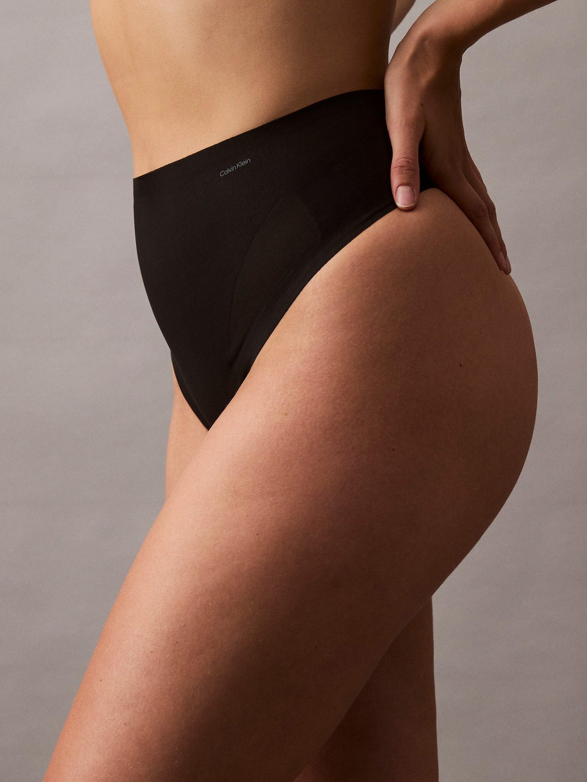 Product image 5 of 7, which shows Calvin Klein Stay-Put Mesh High Waist Shapewear Thong, Black, XS