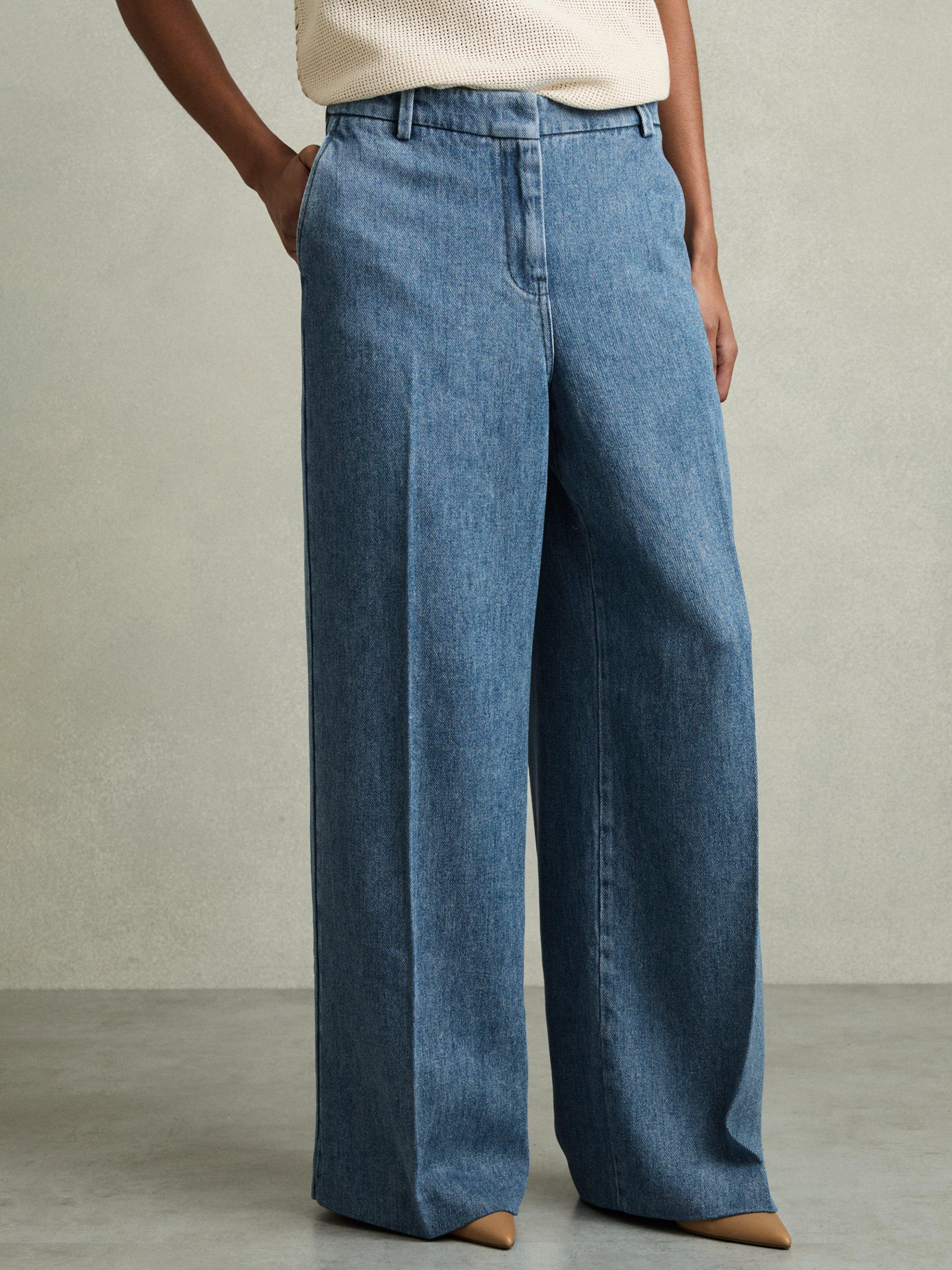 Product image 1 of 5, which shows Reiss Petite Reed Denim Look Wide Leg Trousers, Mid Blue, 6Pt