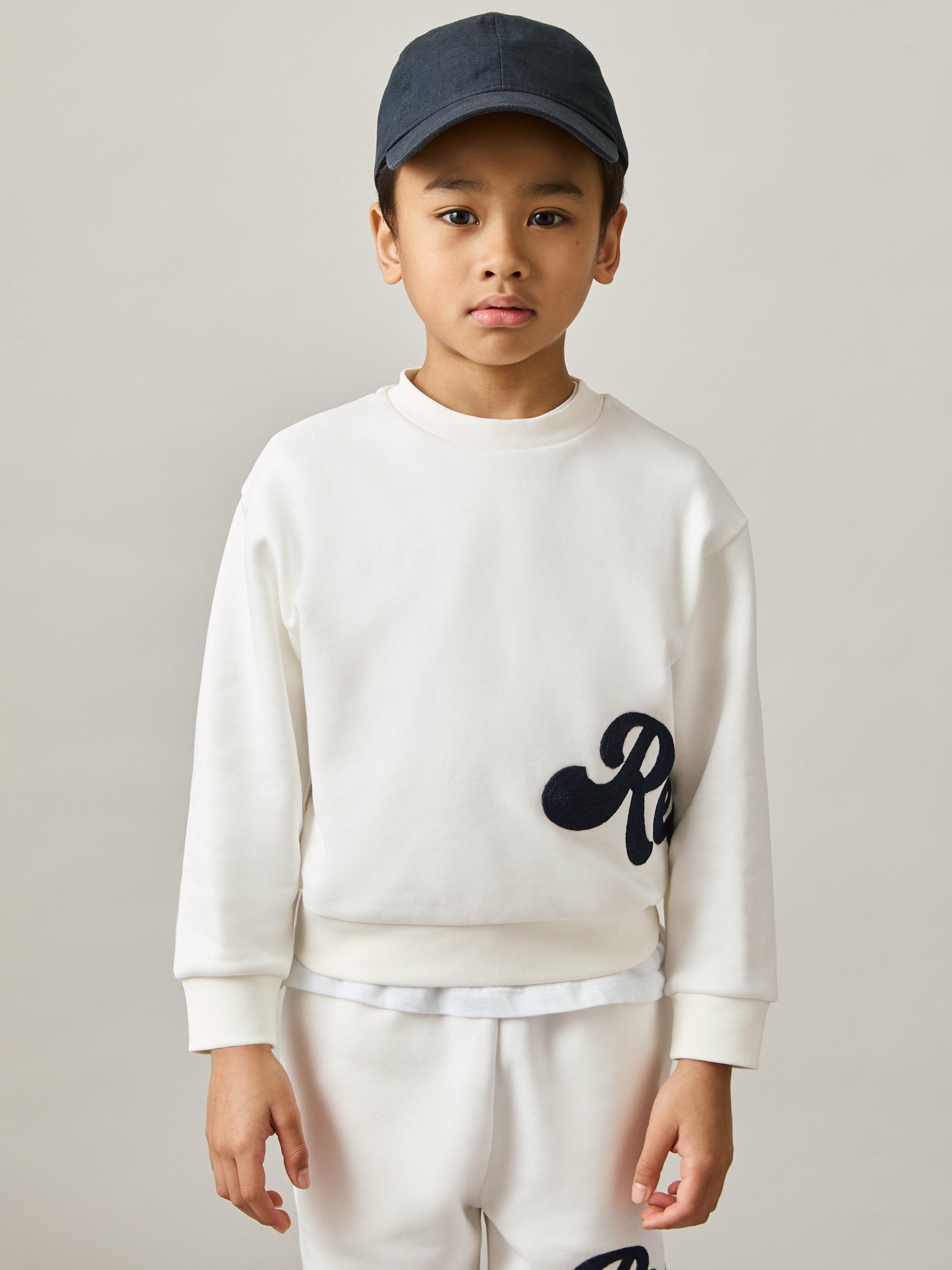 Product image 2 of 4, which shows Reiss Kids' Grover Logo Sweatshirt, White, 8-9 years