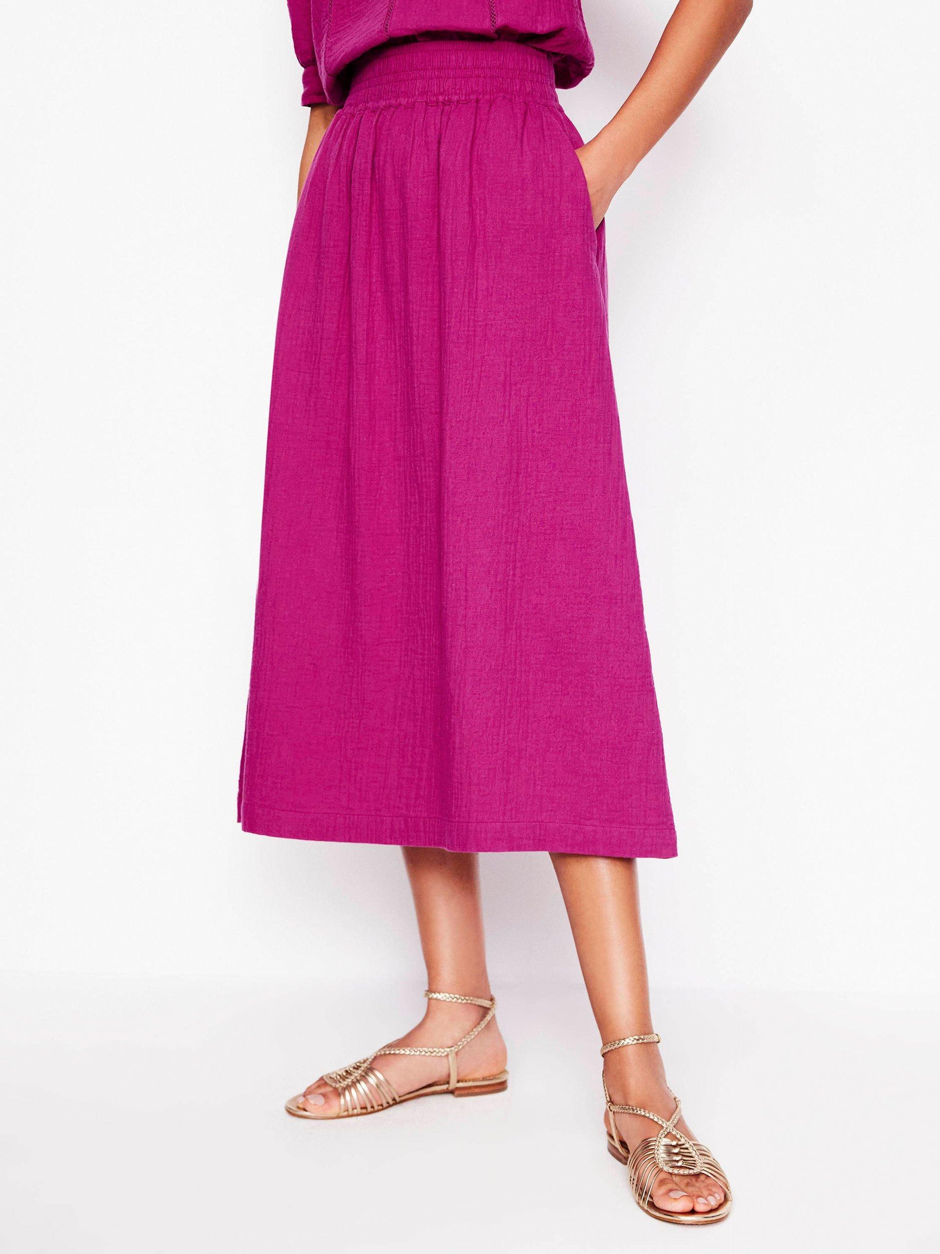 Product image 4 of 5, which shows Boden Cotton Doublecloth Smocked Midi Skirt, Fuchsia, 8