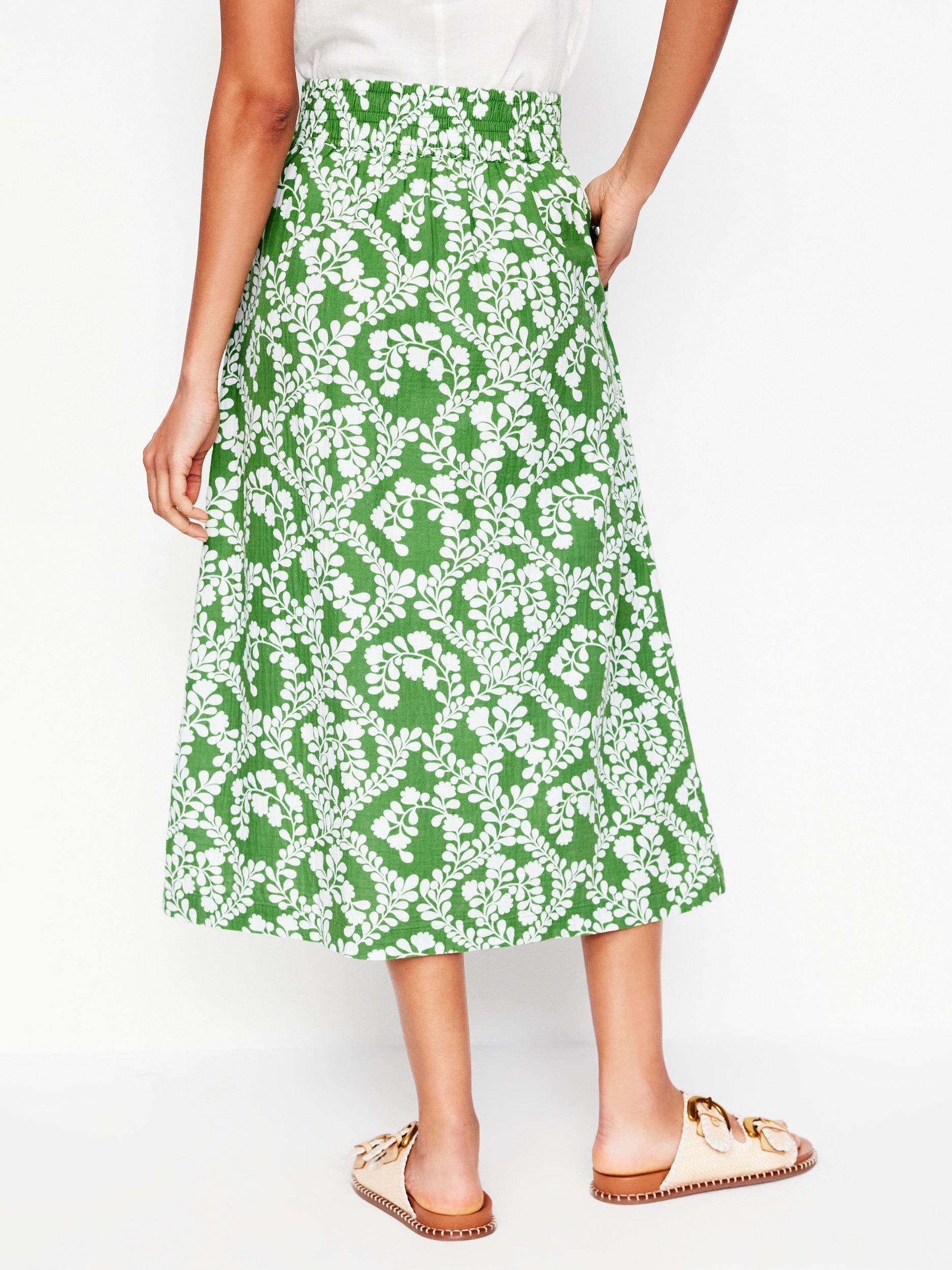 Product image 3 of 5, which shows Boden Cotton Doublecloth Floral Print Smocked Midi Skirt, Green/Multi, 12