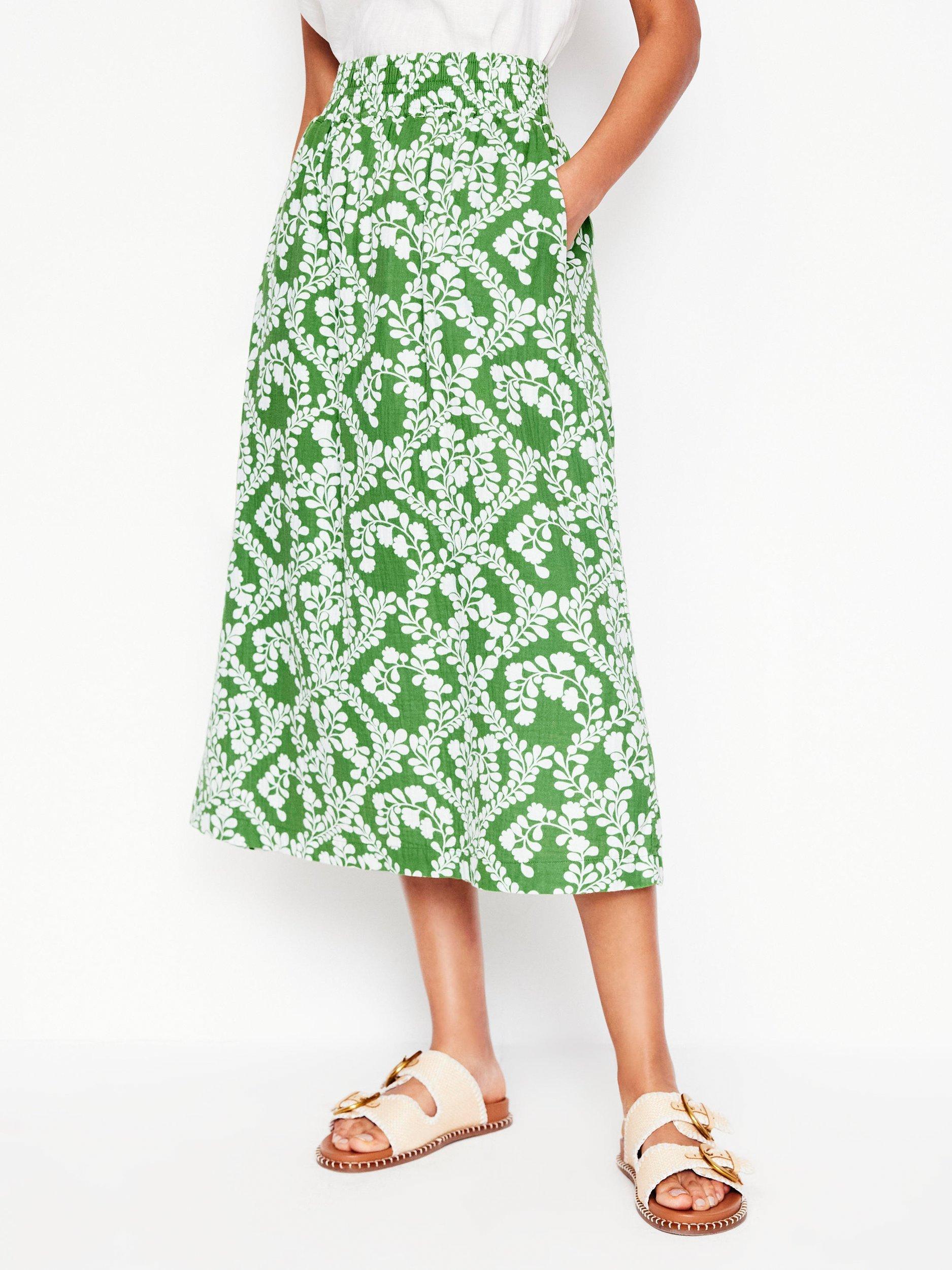 Product image 4 of 5, which shows Boden Cotton Doublecloth Floral Print Smocked Midi Skirt, Green/Multi, 12