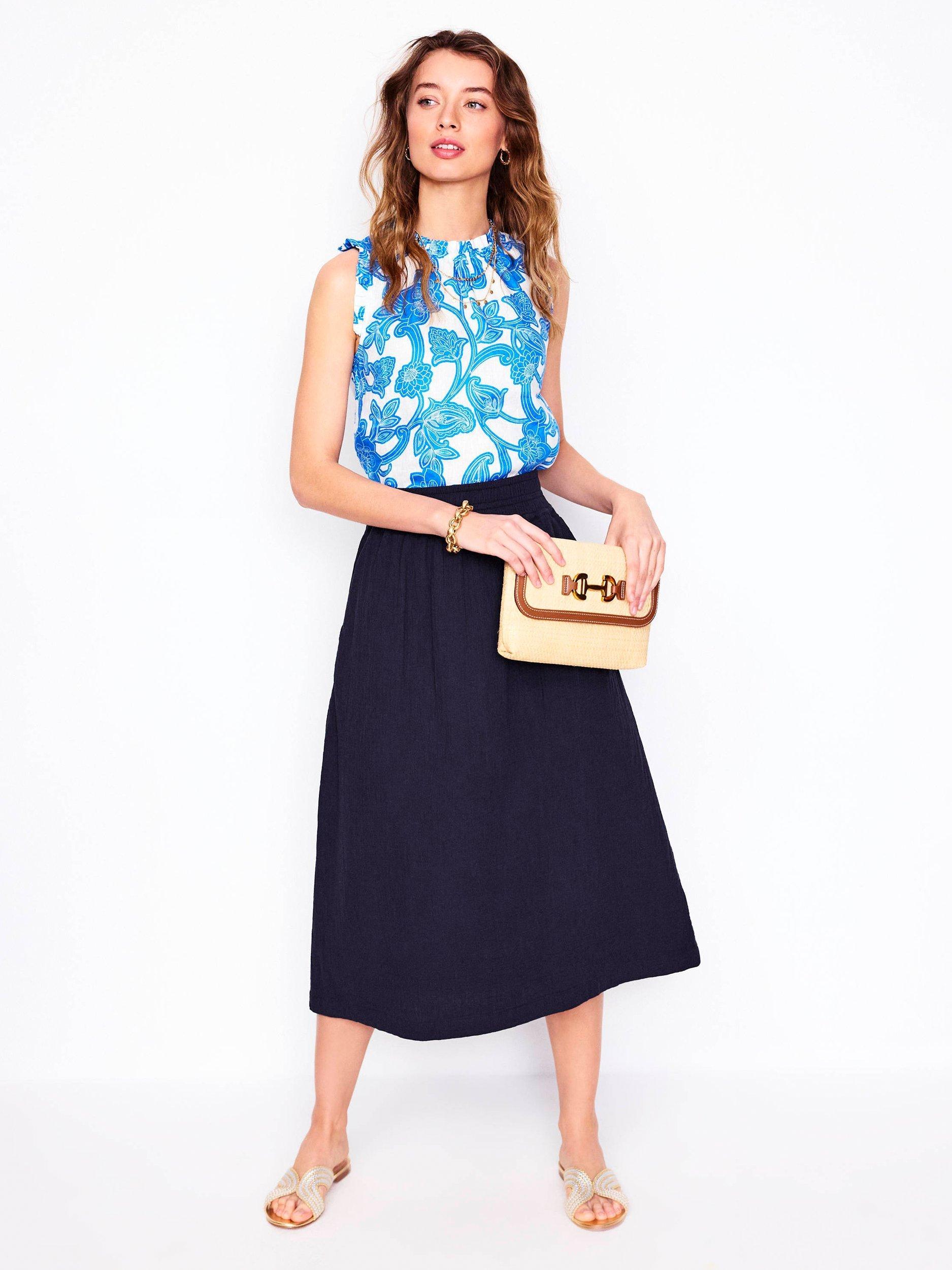 Product image 1 of 5, which shows Boden Cotton Doublecloth Smocked Midi Skirt, Navy, 8