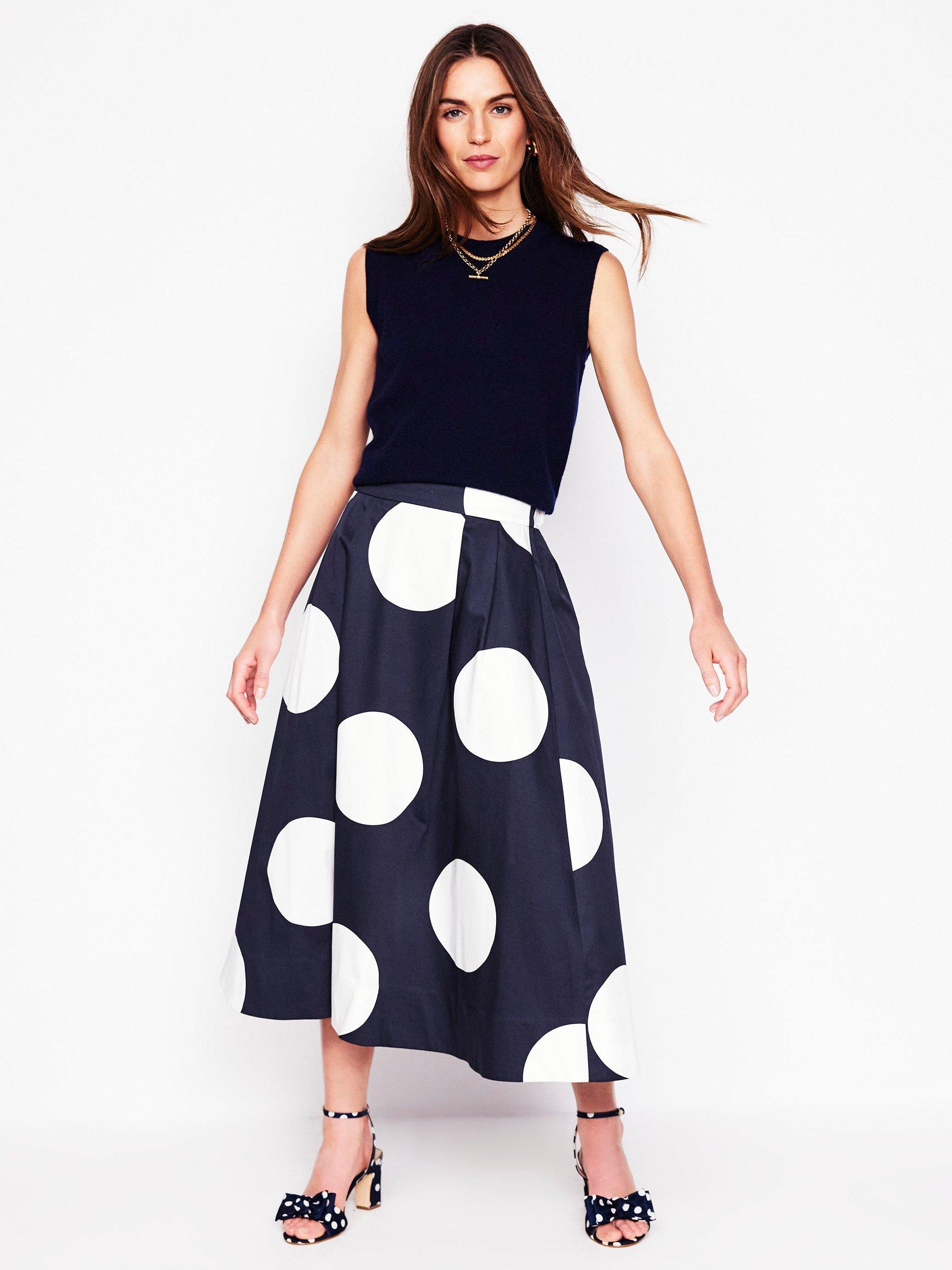 Product image 1 of 5, which shows Boden Isabella Sateen Polka Dot Midi Skirt, Navy, 8