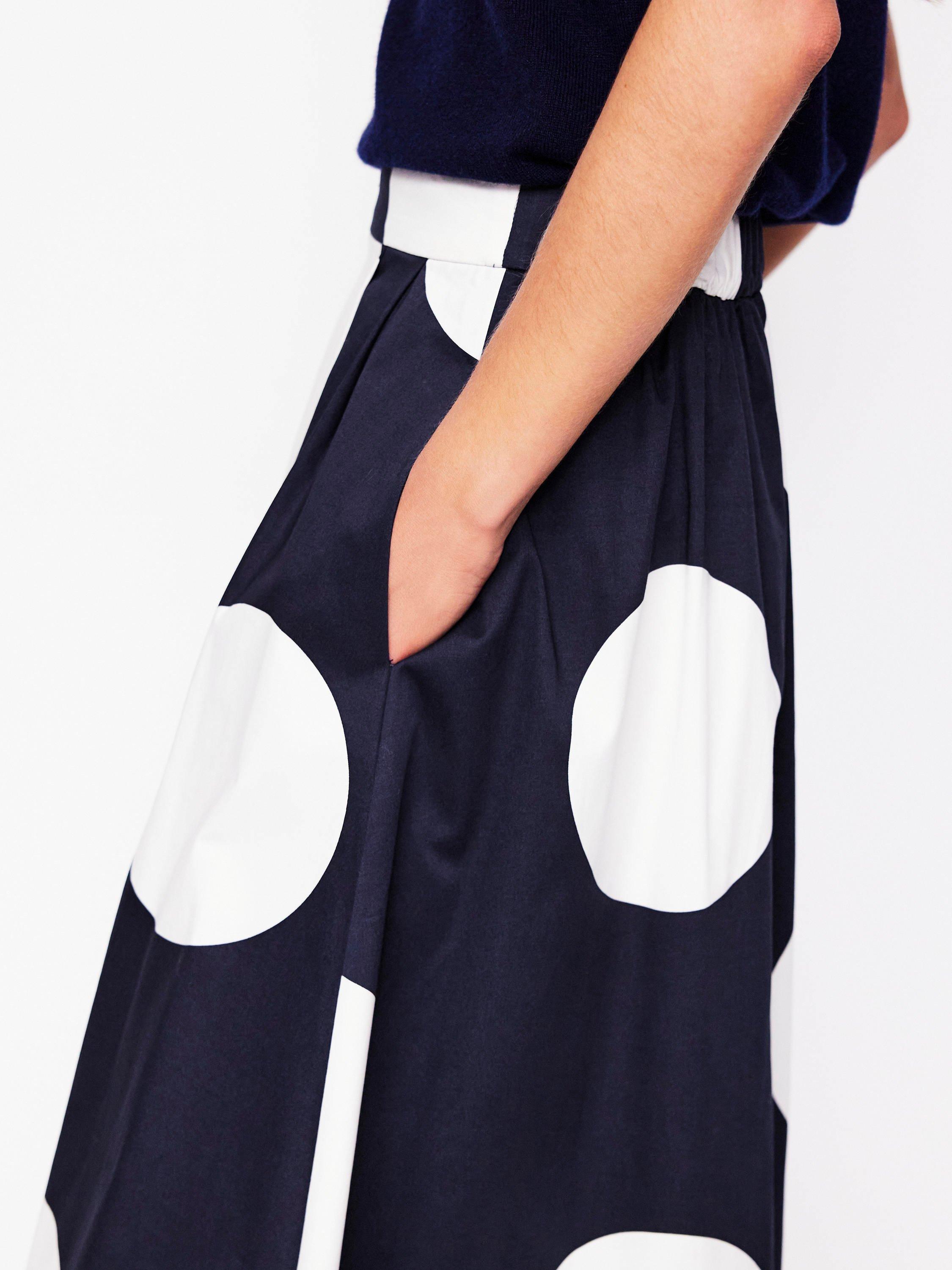 Product image 2 of 5, which shows Boden Isabella Sateen Polka Dot Midi Skirt, Navy, 8