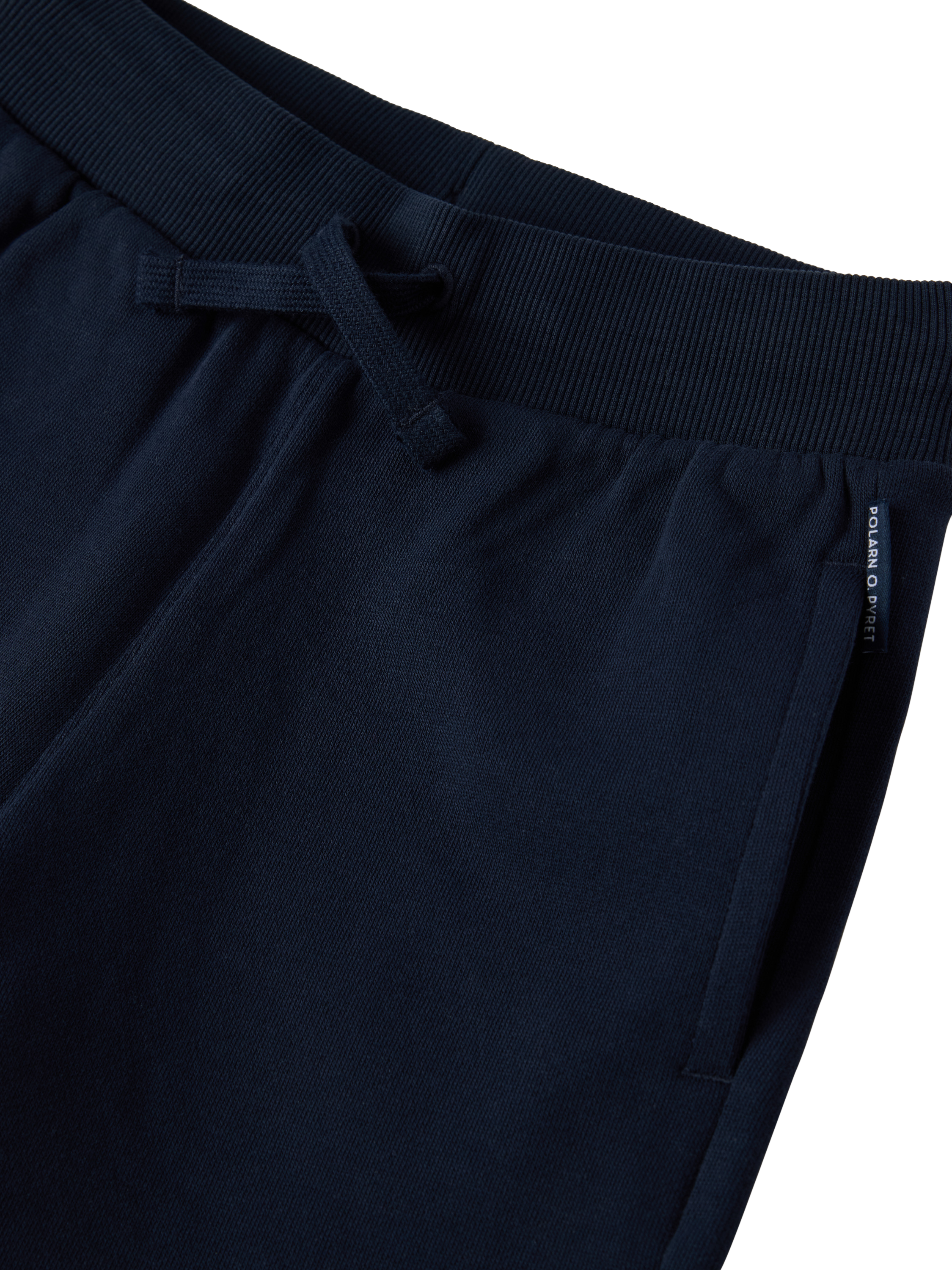 Product image 2 of 3, which shows Polarn O. Pyret Kids' Organic Cotton Jogger Shorts, Dark Blue, 12-18 months