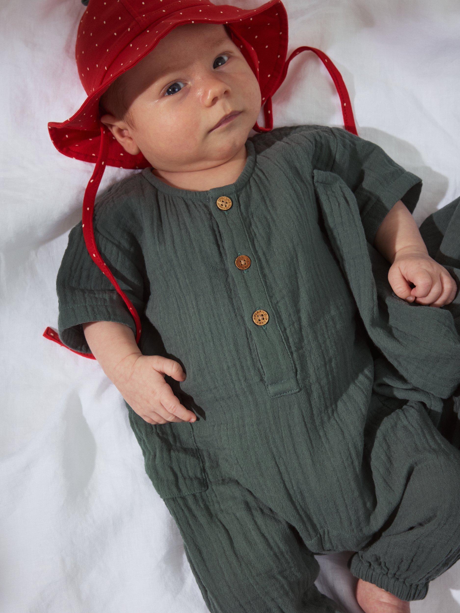 Product image 1 of 3, which shows Polarn O. Pyret Baby Organic Cotton Muslin Romper, Green, 6-9 months