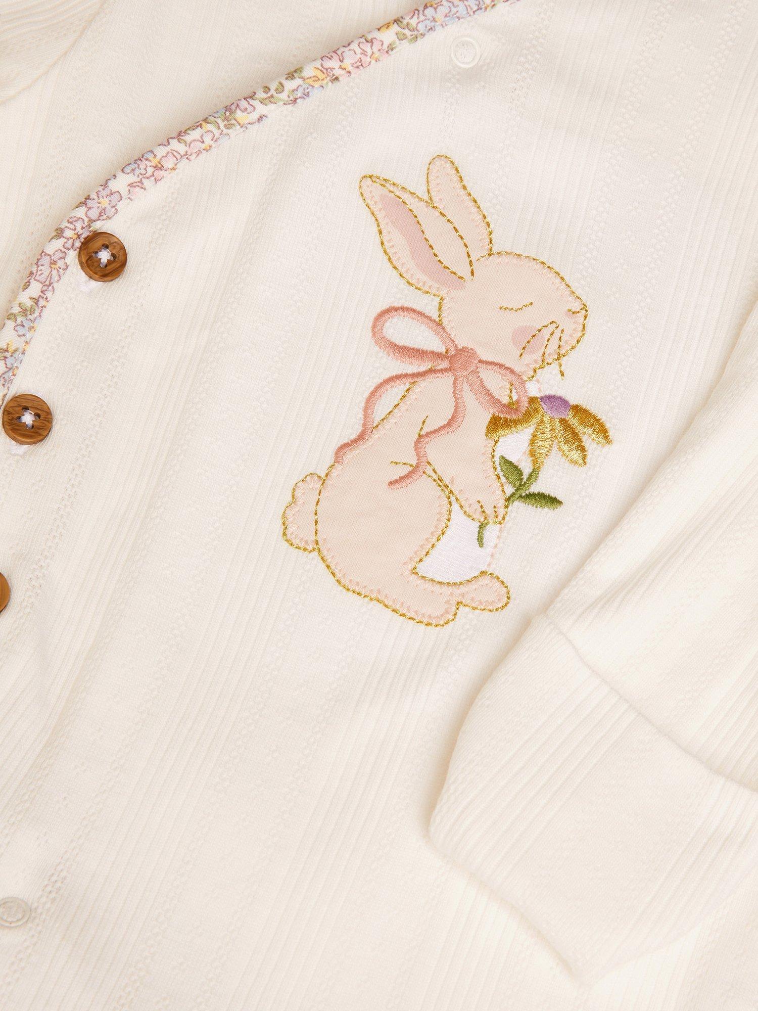 Product image 3 of 3, which shows Monsoon Baby Newborn Peri Bunny Embroidered Sleepsuit, Ivory, 9-12 months