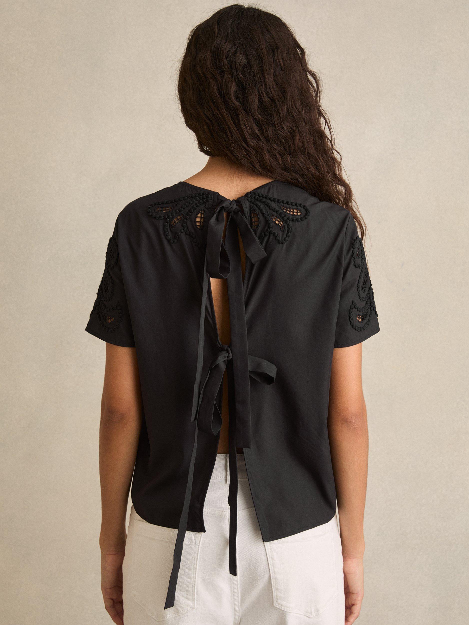 Product image 2 of 6, which shows Reiss Iyla Short Sleeve Floral Cut Out Embroidered Top, Black, 6