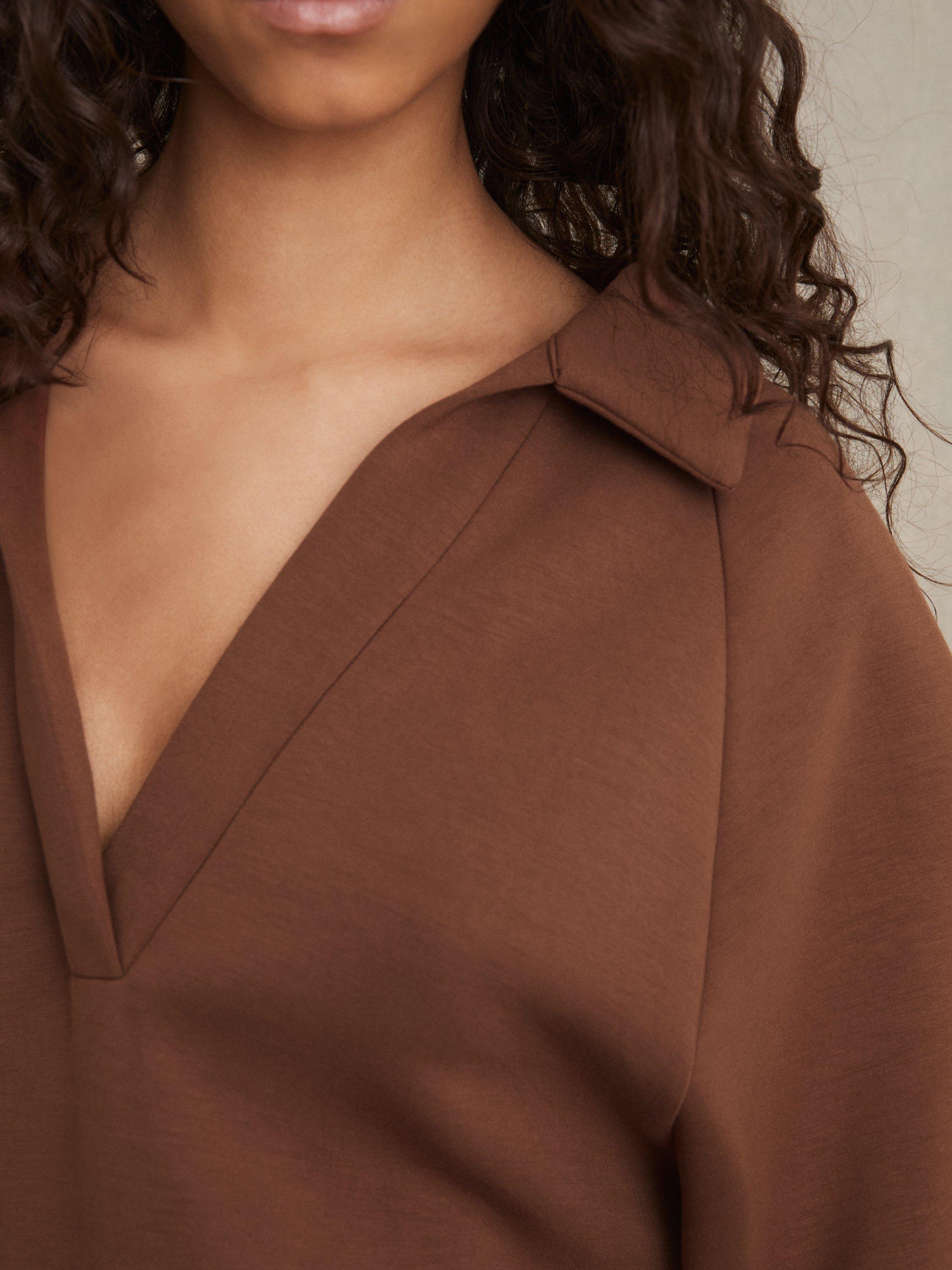 Product image 4 of 5, which shows Reiss Jodie Polo Neck Oversized Sweatshirt, Toffee Brown, XS