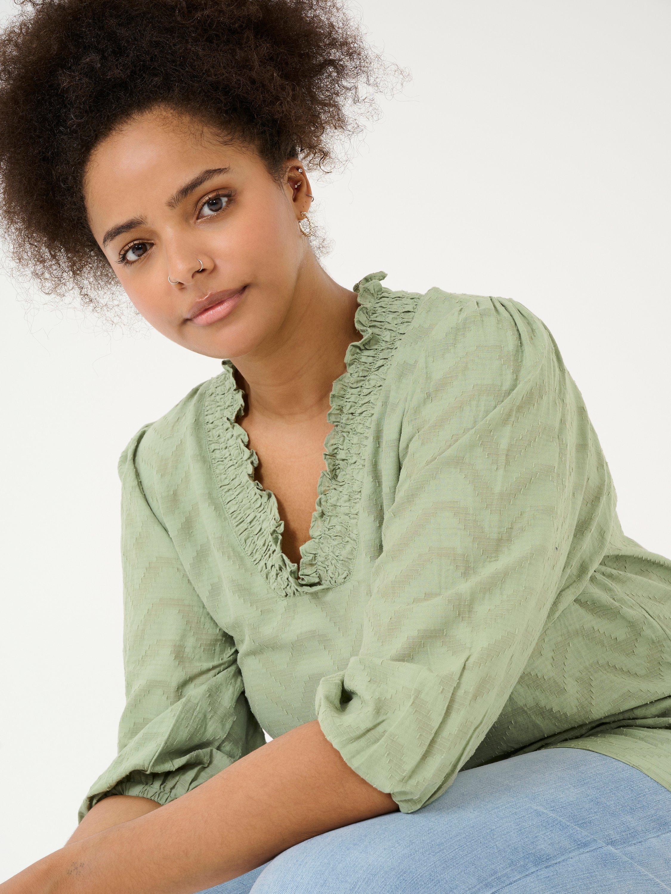Product image 4 of 6, which shows KAFFE Curve Vitana Frill V-Neck Top, Oil Green, 20