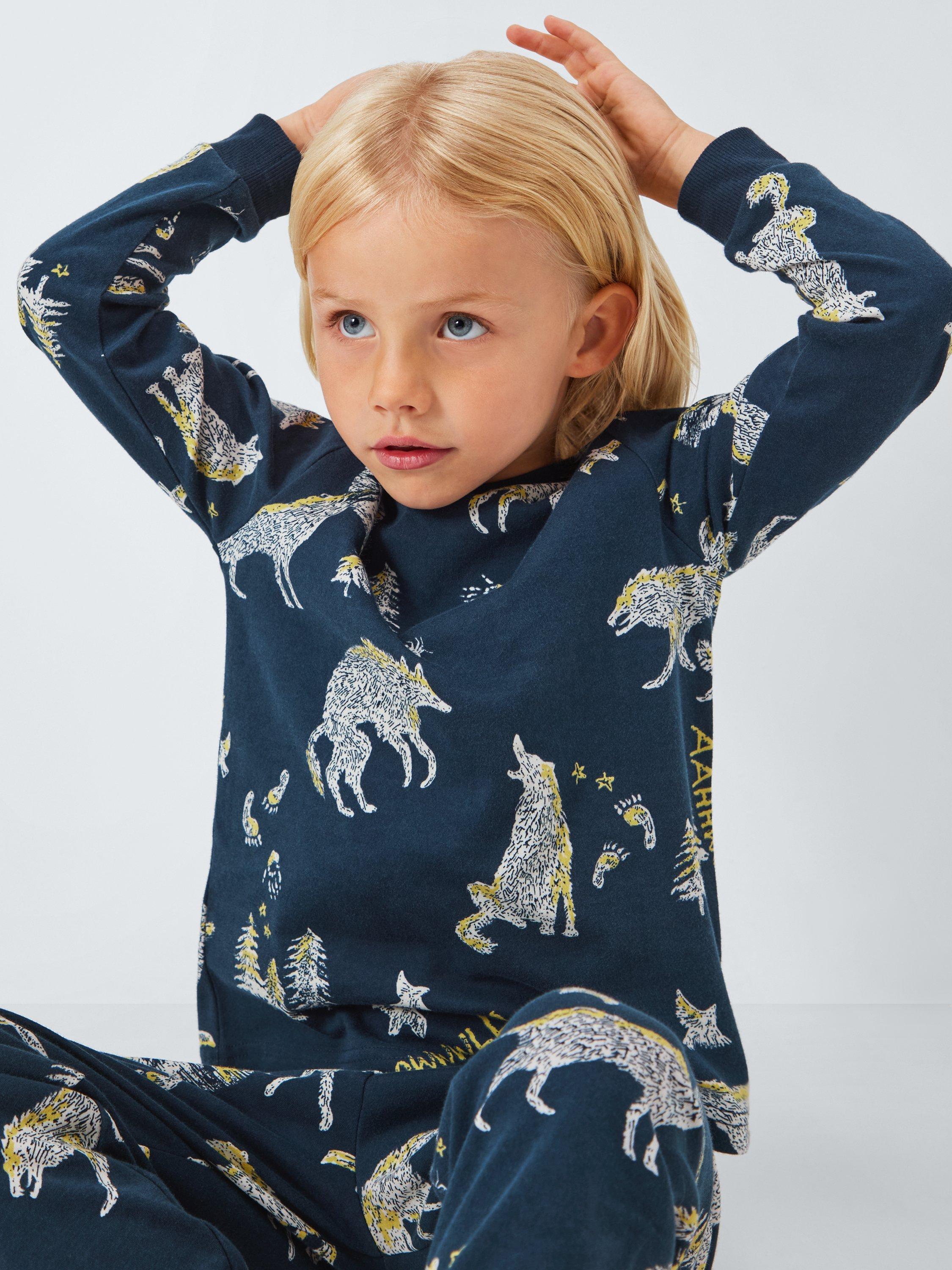 Product image 4 of 6, which shows John Lewis Kids' Wolves Glow in the Dark Pyjamas, Blue, 7 years