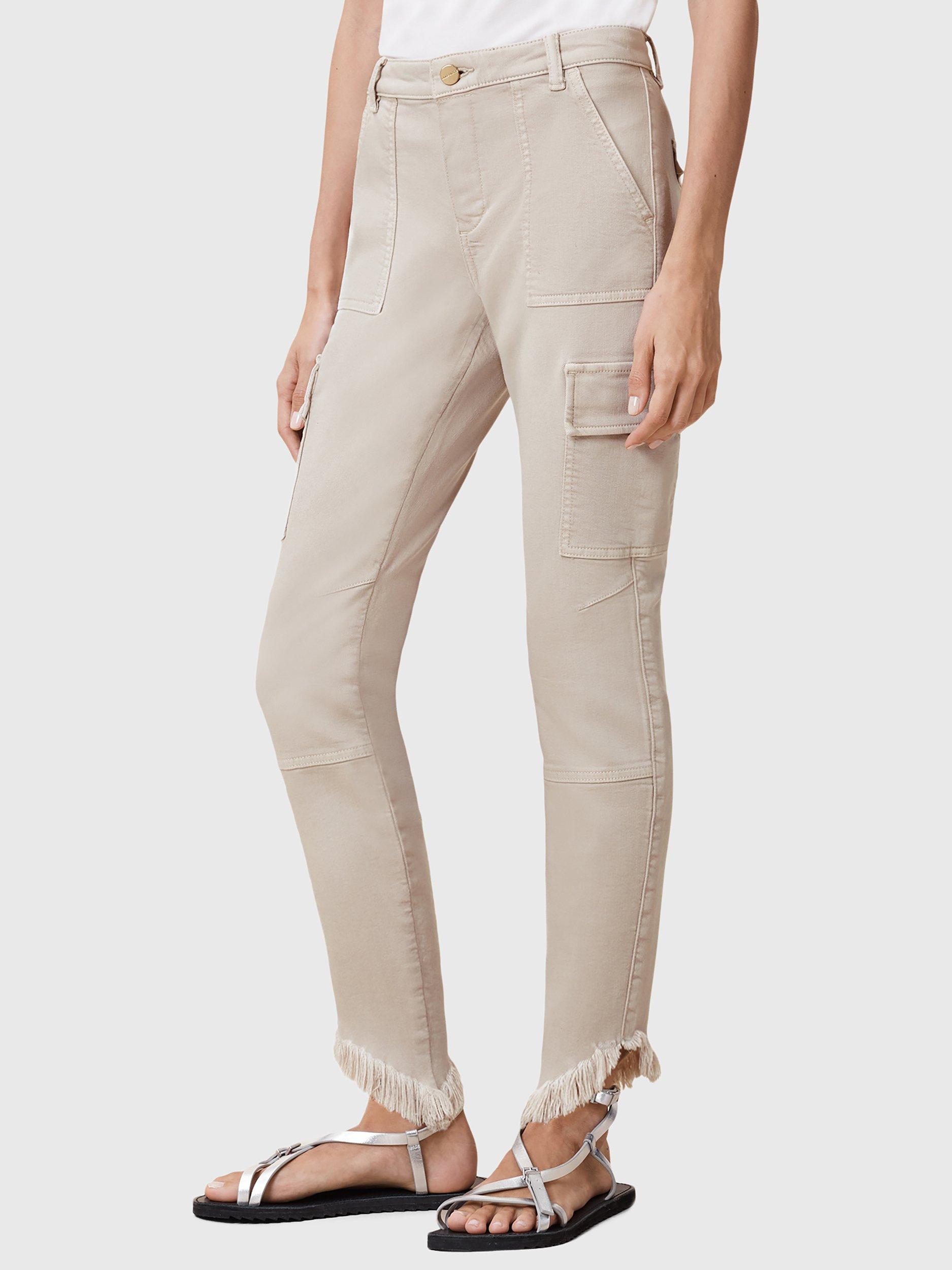 Product image 1 of 10, which shows AllSaints Duran Asymmetrical Cotton Blend Cargo Jeans, Cream, 25