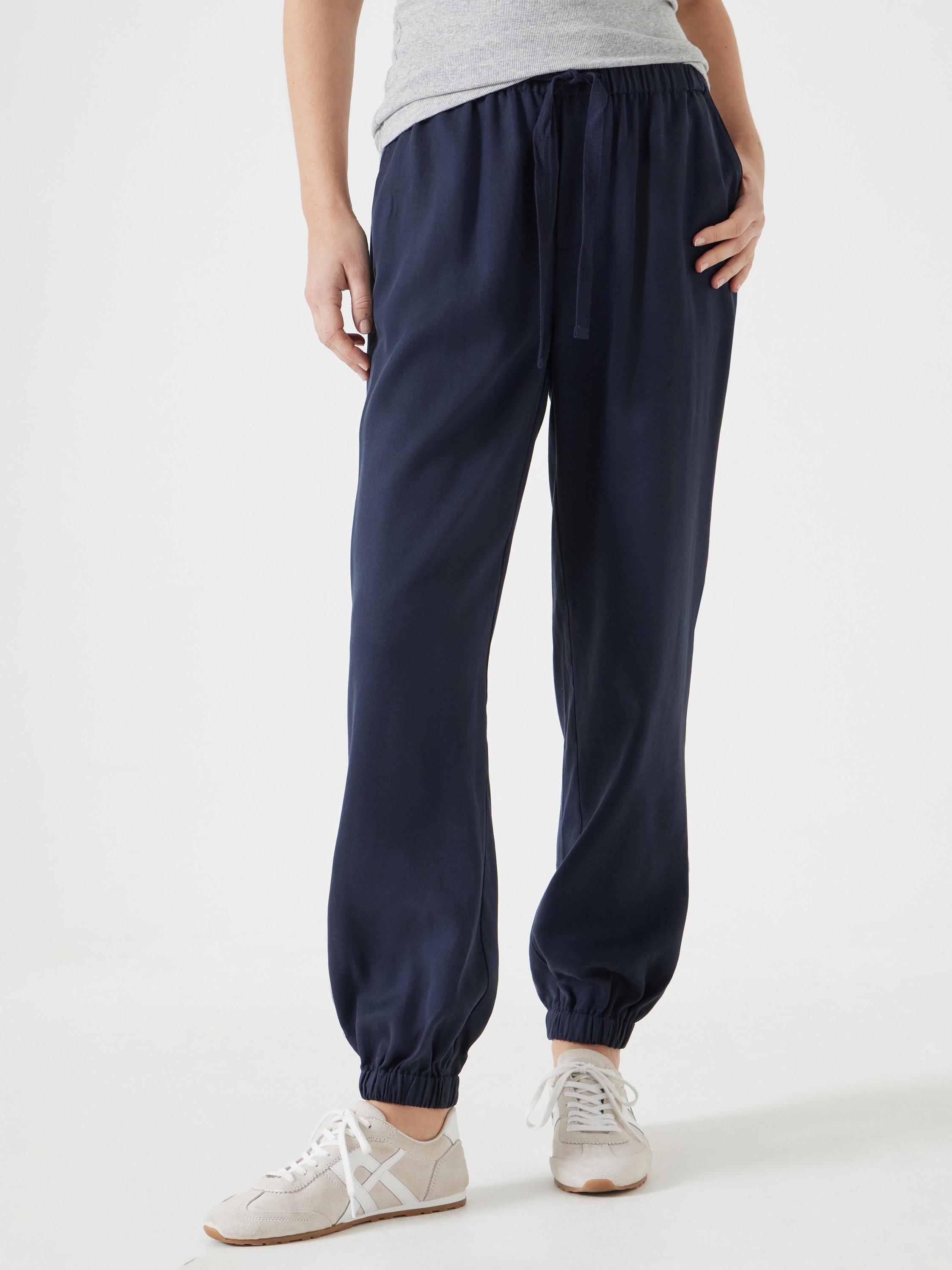 Product image 1 of 6, which shows HUSH Paloma Tencel Tapered Trousers, Dark Navy, 4R