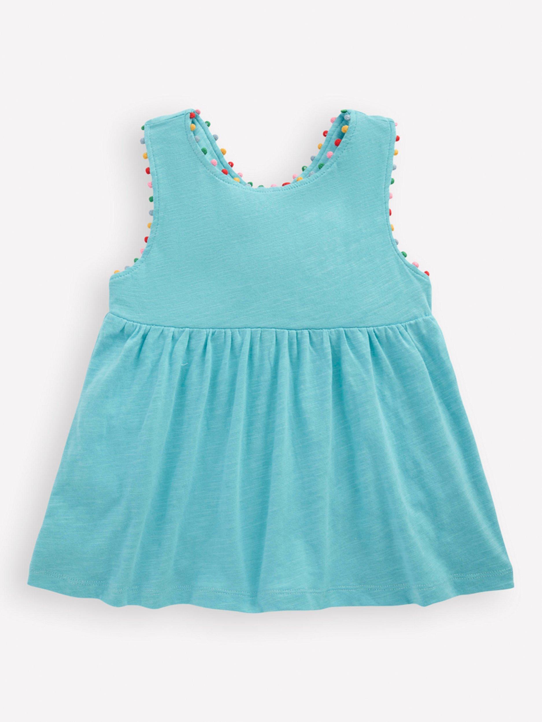 Product image 1 of 3, which shows Mini Boden Kids' Cotton Cross-Back Pom-Pom Trim Top, Blue, 2-3 years