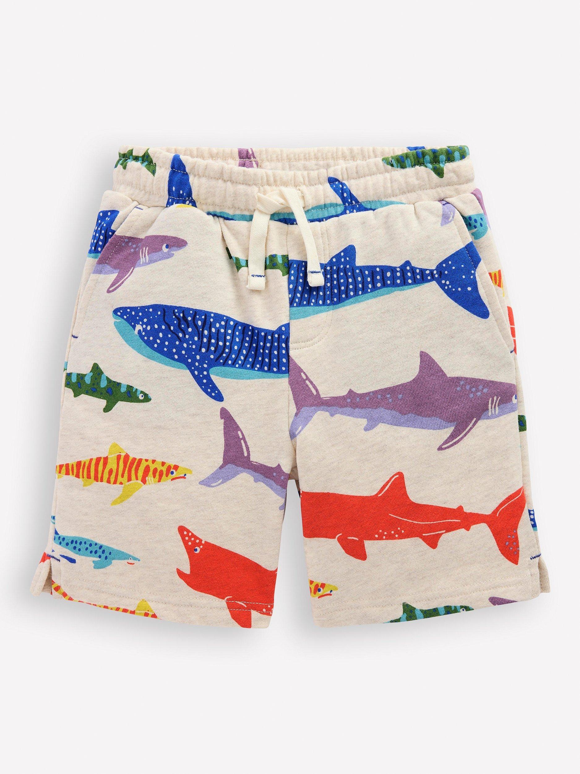 Product image 1 of 3, which shows Mini Boden Kids' Printed Comfy Cotton Shorts, Oatmeal Marl Shark, 9-10 years