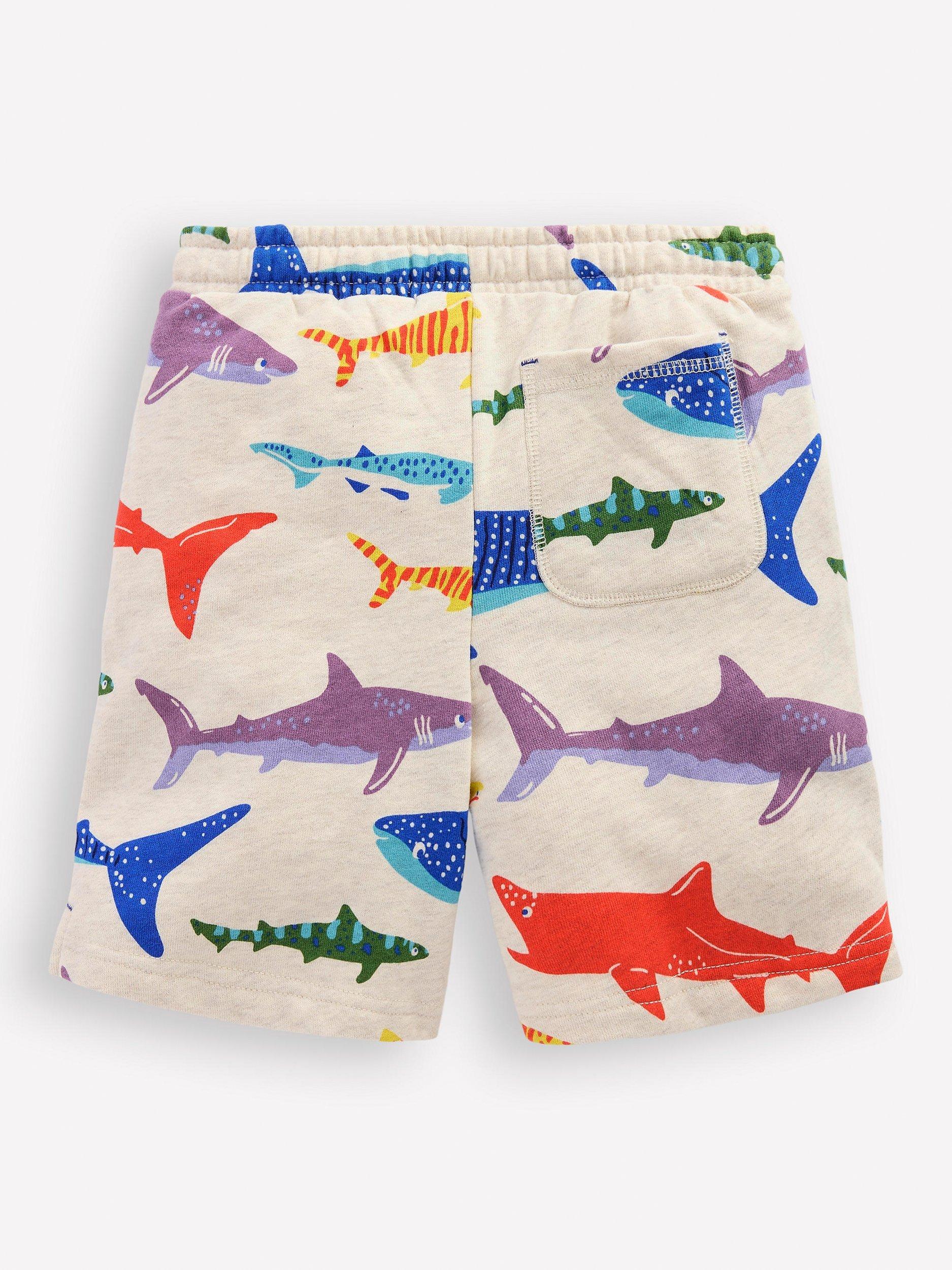 Product image 2 of 3, which shows Mini Boden Kids' Printed Comfy Cotton Shorts, Oatmeal Marl Shark, 9-10 years