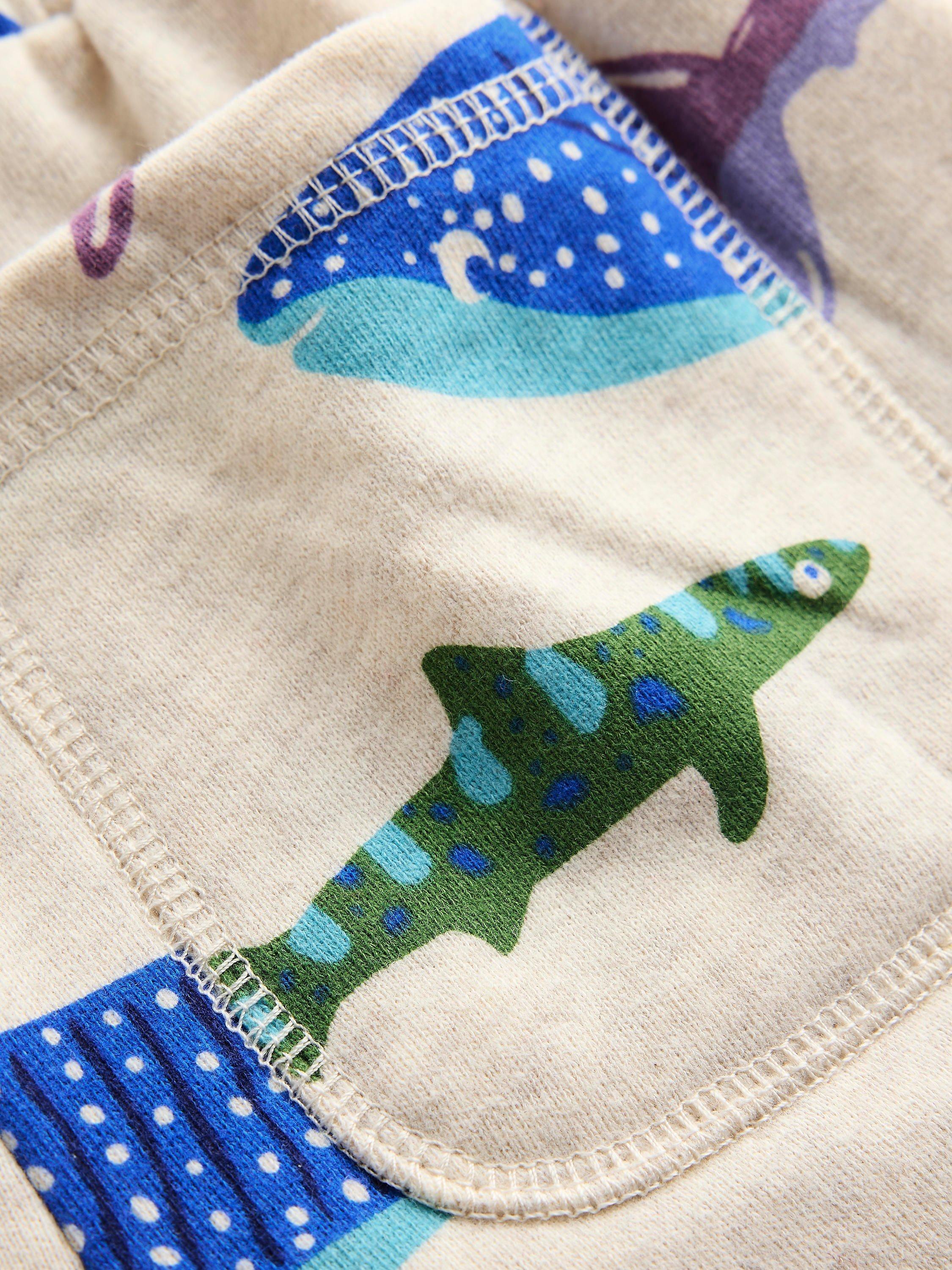 Product image 3 of 3, which shows Mini Boden Kids' Printed Comfy Cotton Shorts, Oatmeal Marl Shark, 9-10 years