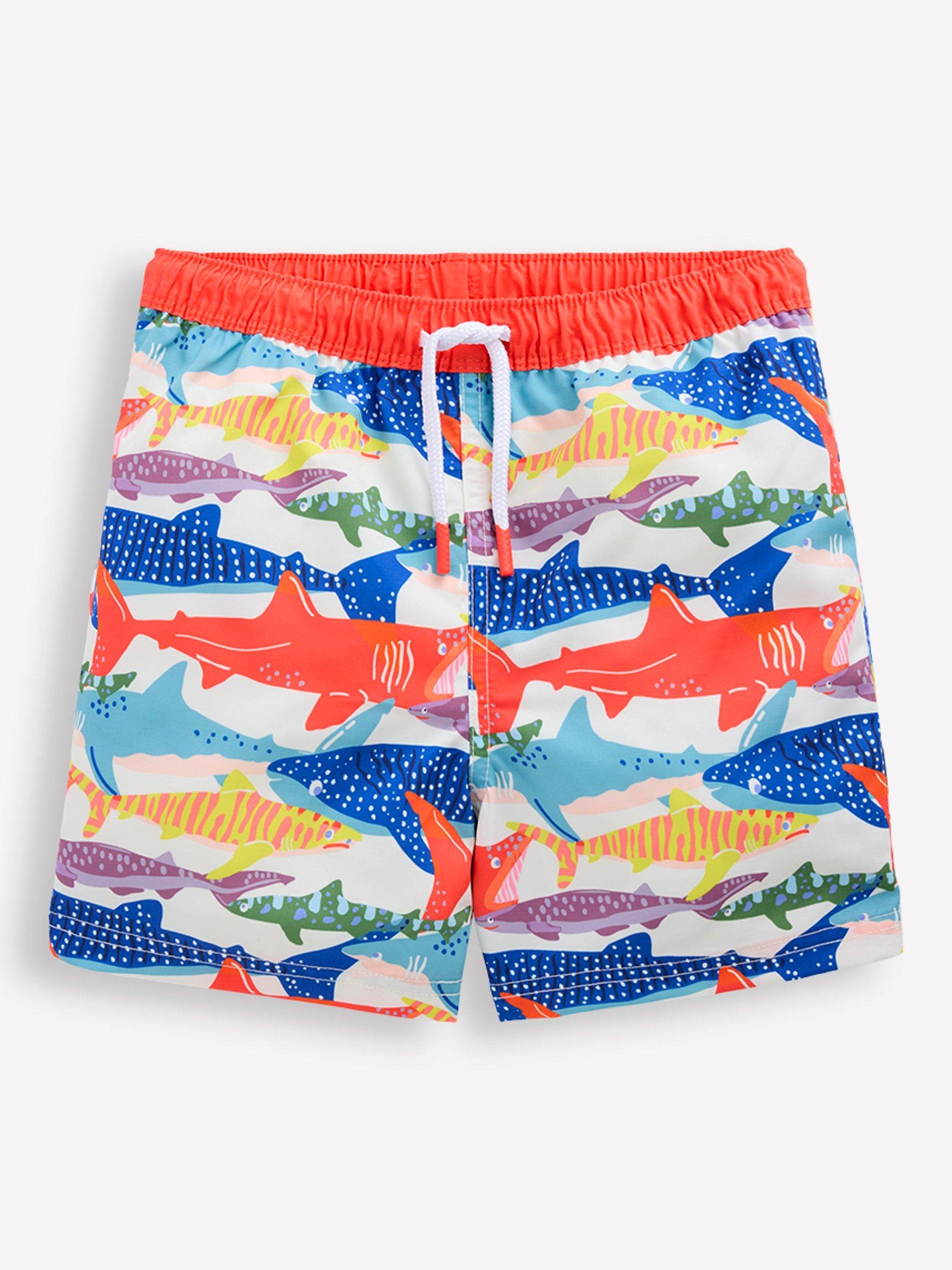 Product image 1 of 3, which shows Mini Boden Kids' Shark Print Swim Shorts, Ivory Riso Shark, 2-3 years