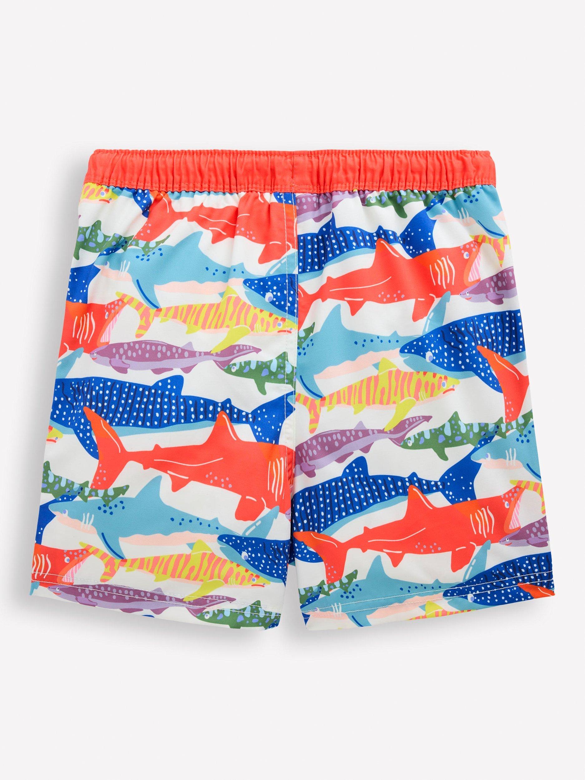 Product image 2 of 3, which shows Mini Boden Kids' Shark Print Swim Shorts, Ivory Riso Shark, 2-3 years