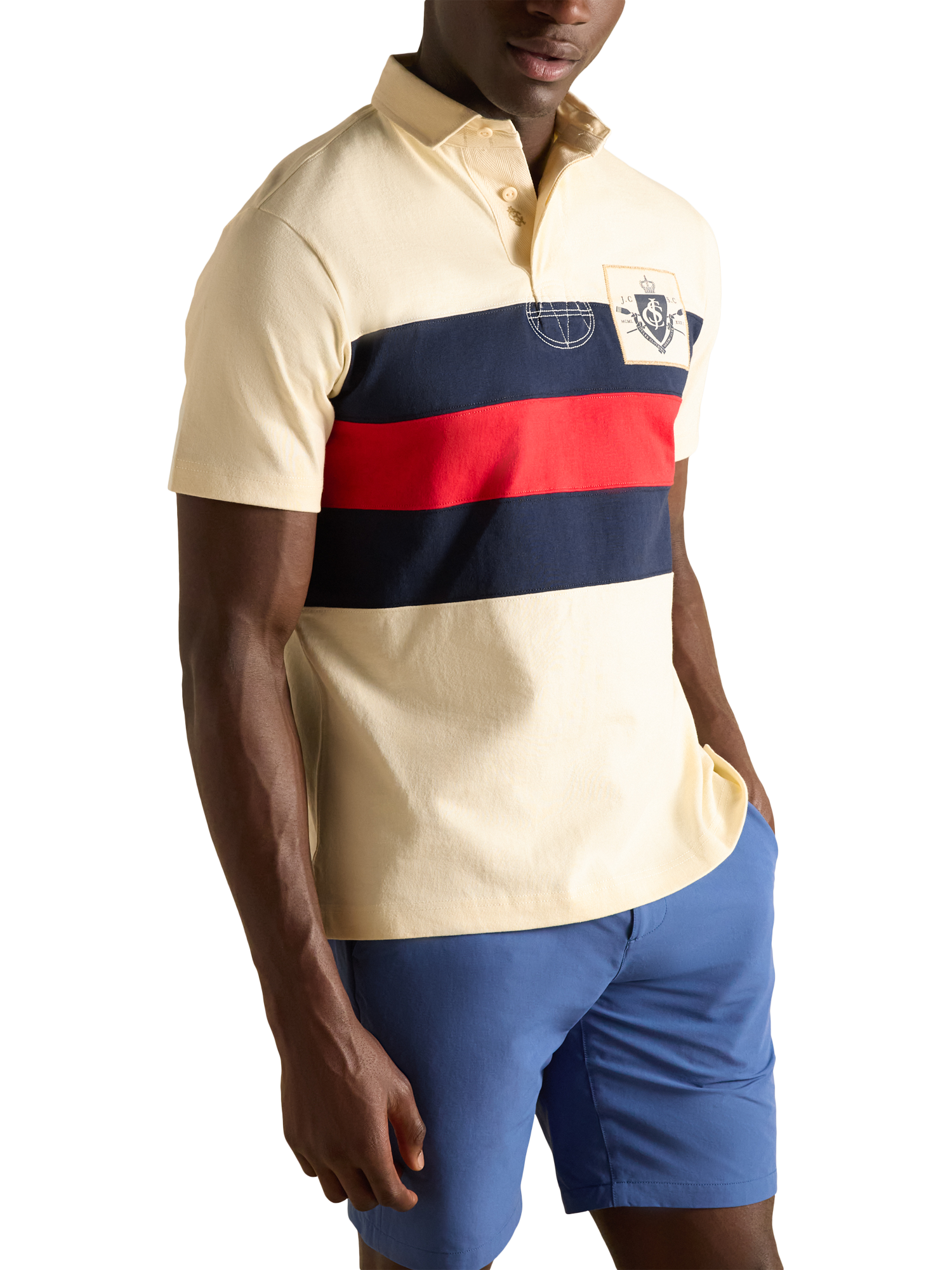 Product image 1 of 6, which shows Joules Crossfield Cotton Regular Fit Short Sleeve Polo Shirt, Cream/Multi, S Reg