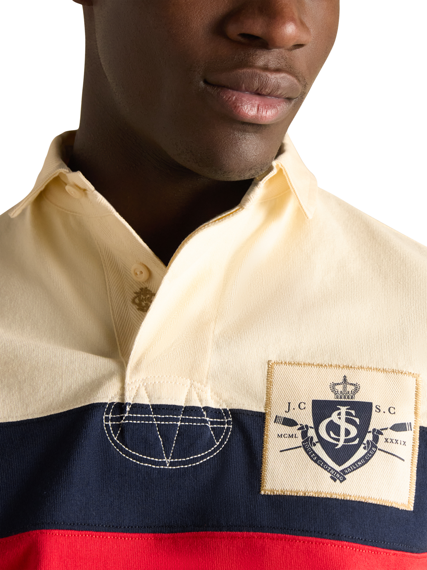 Product image 4 of 6, which shows Joules Crossfield Cotton Regular Fit Short Sleeve Polo Shirt, Cream/Multi, S Reg