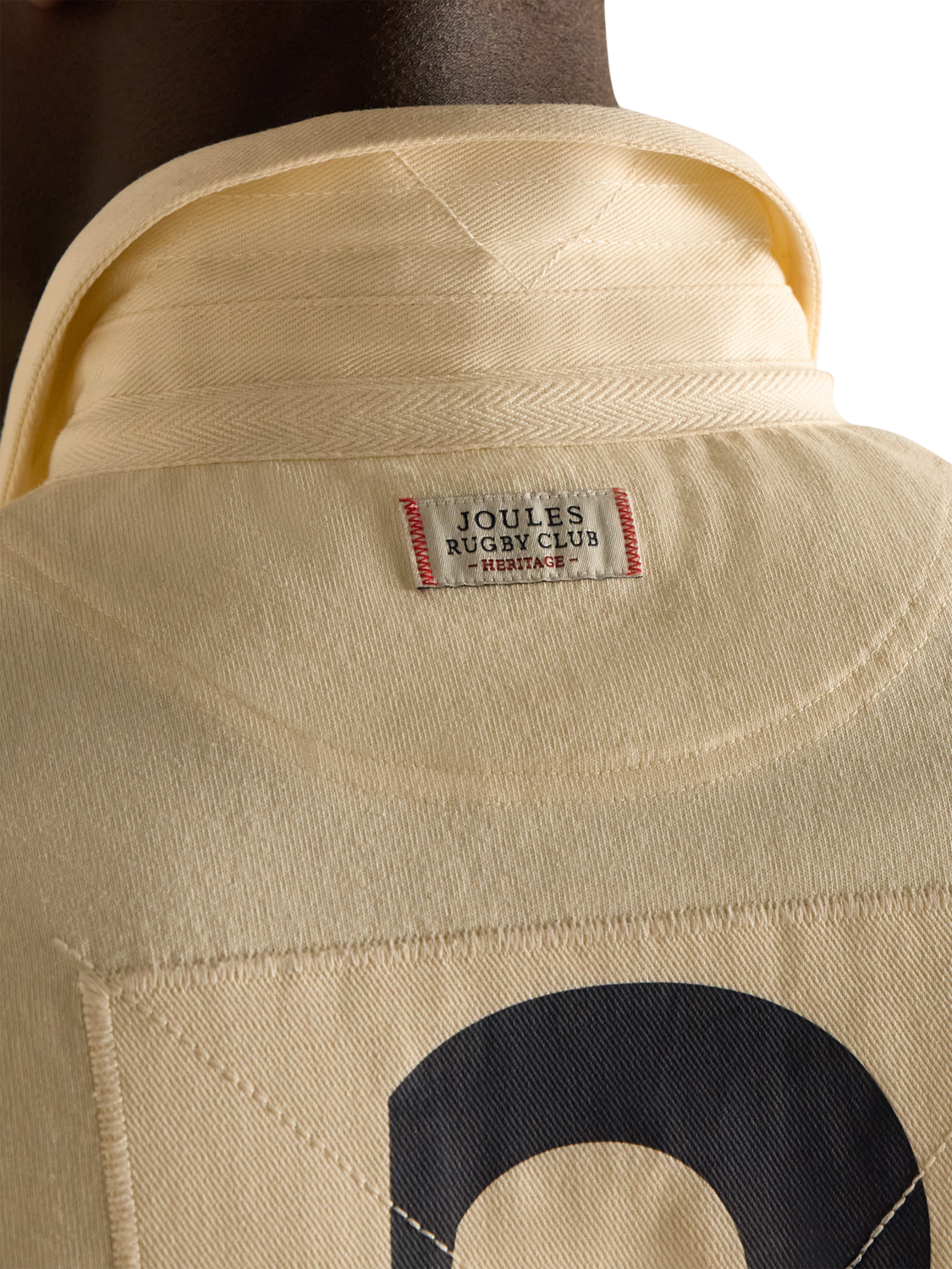 Product image 5 of 6, which shows Joules Crossfield Cotton Regular Fit Short Sleeve Polo Shirt, Cream/Multi, S Reg