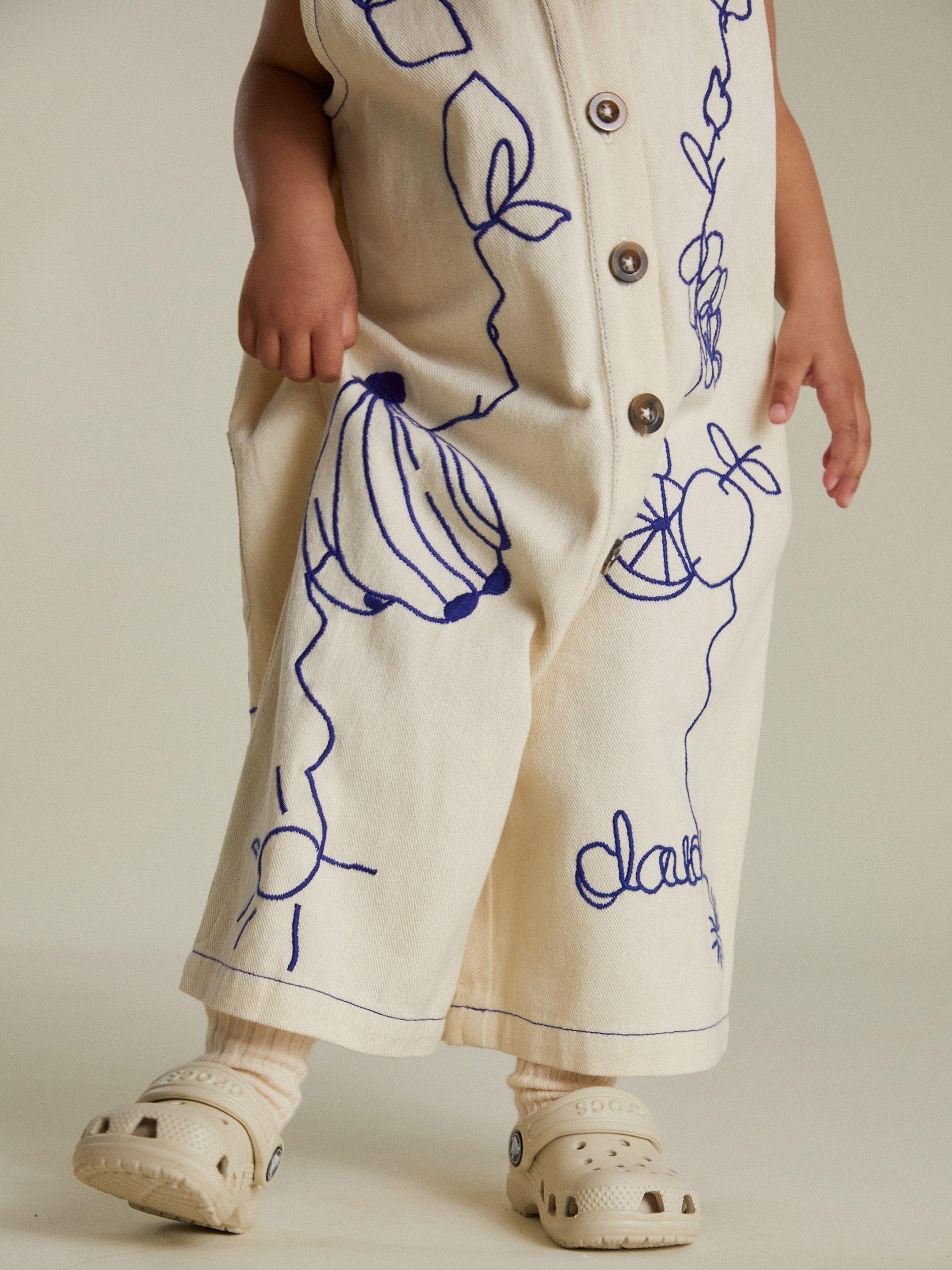 Product image 2 of 7, which shows Claude & Co Kids' Cali Overalls, White, 6-12 months