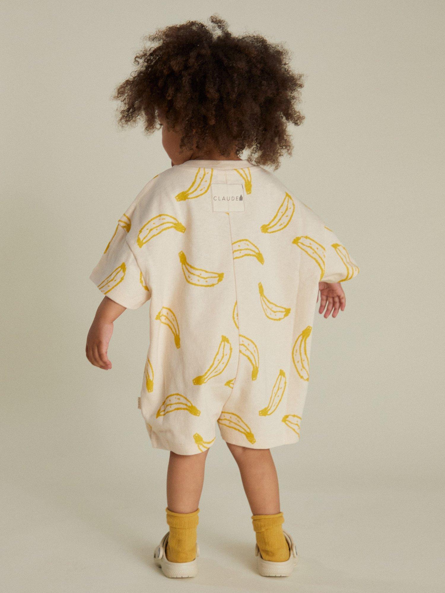 Product image 4 of 5, which shows Claude & Co Kids' Opal Cotton Banana Romper, Soft Cream, 3-6 months