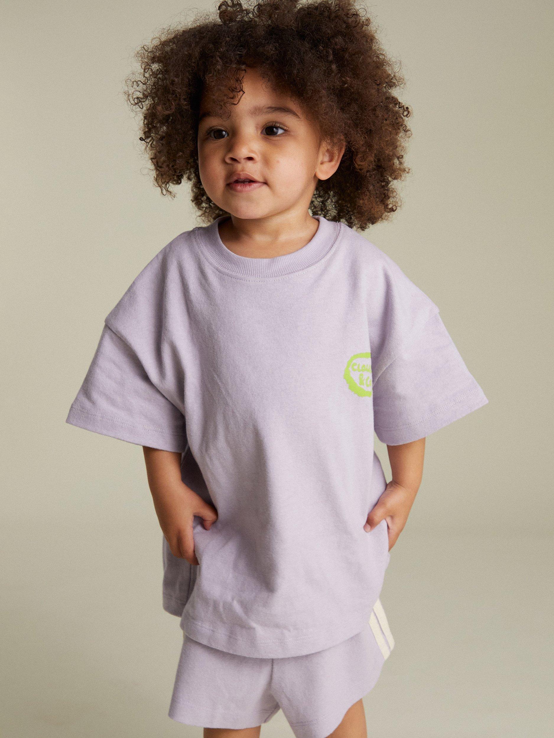 Product image 1 of 7, which shows Claude & Co  Kids' Edie Cotton Fruit Print T-Shirt, Lilac, 6-12 months