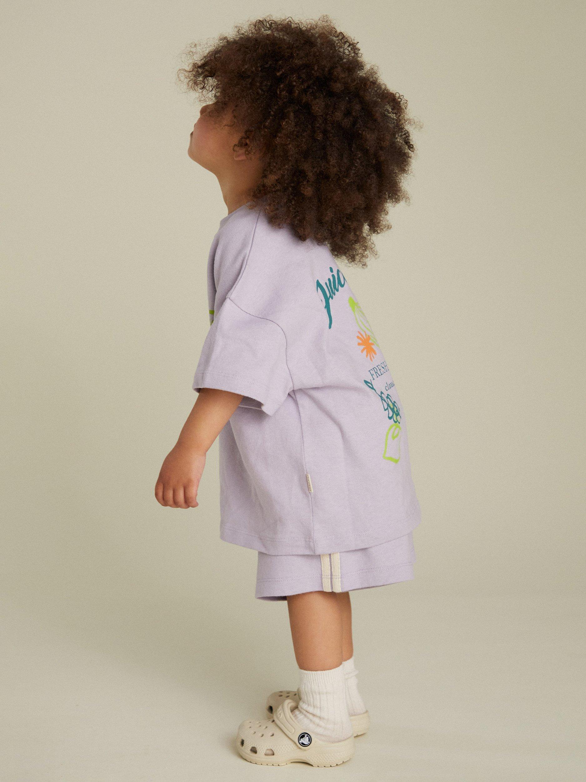 Product image 4 of 7, which shows Claude & Co  Kids' Edie Cotton Fruit Print T-Shirt, Lilac, 6-12 months