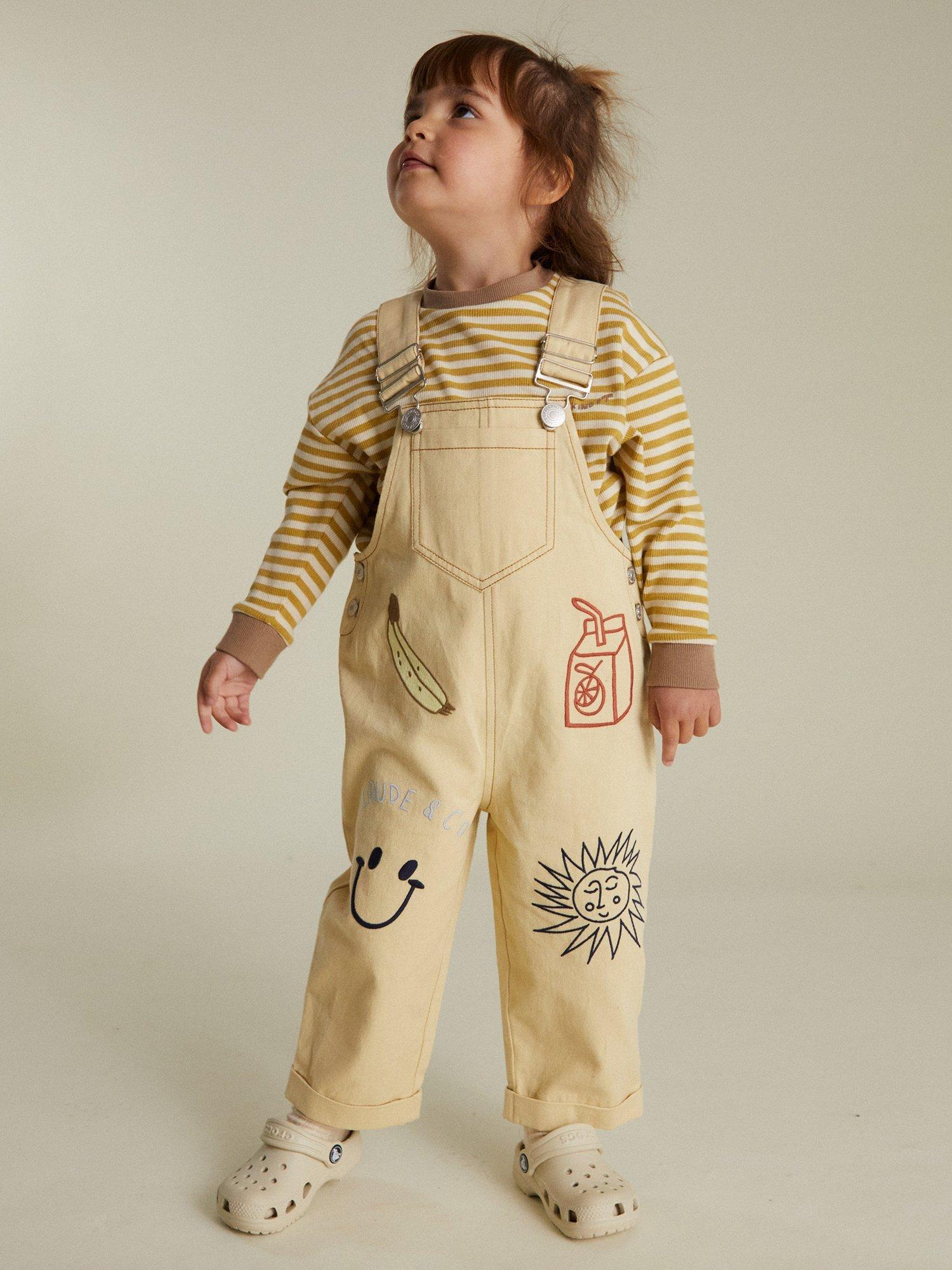 Product image 1 of 6, which shows Claude & Co Kids' Piper Breakfast Cotton Dungarees, Lemon, 6-12 months
