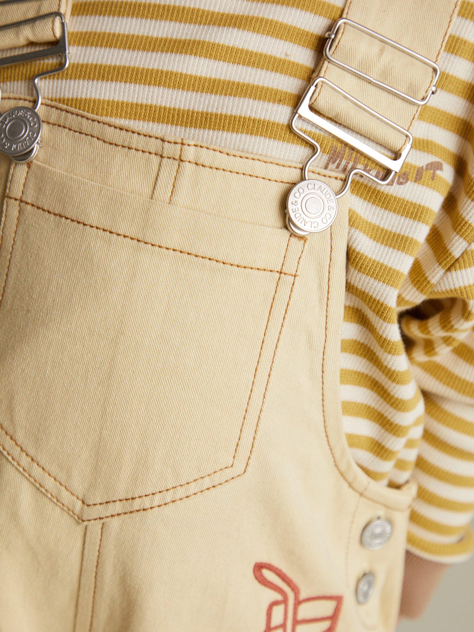 Product image 5 of 6, which shows Claude & Co Kids' Piper Breakfast Cotton Dungarees, Lemon, 6-12 months
