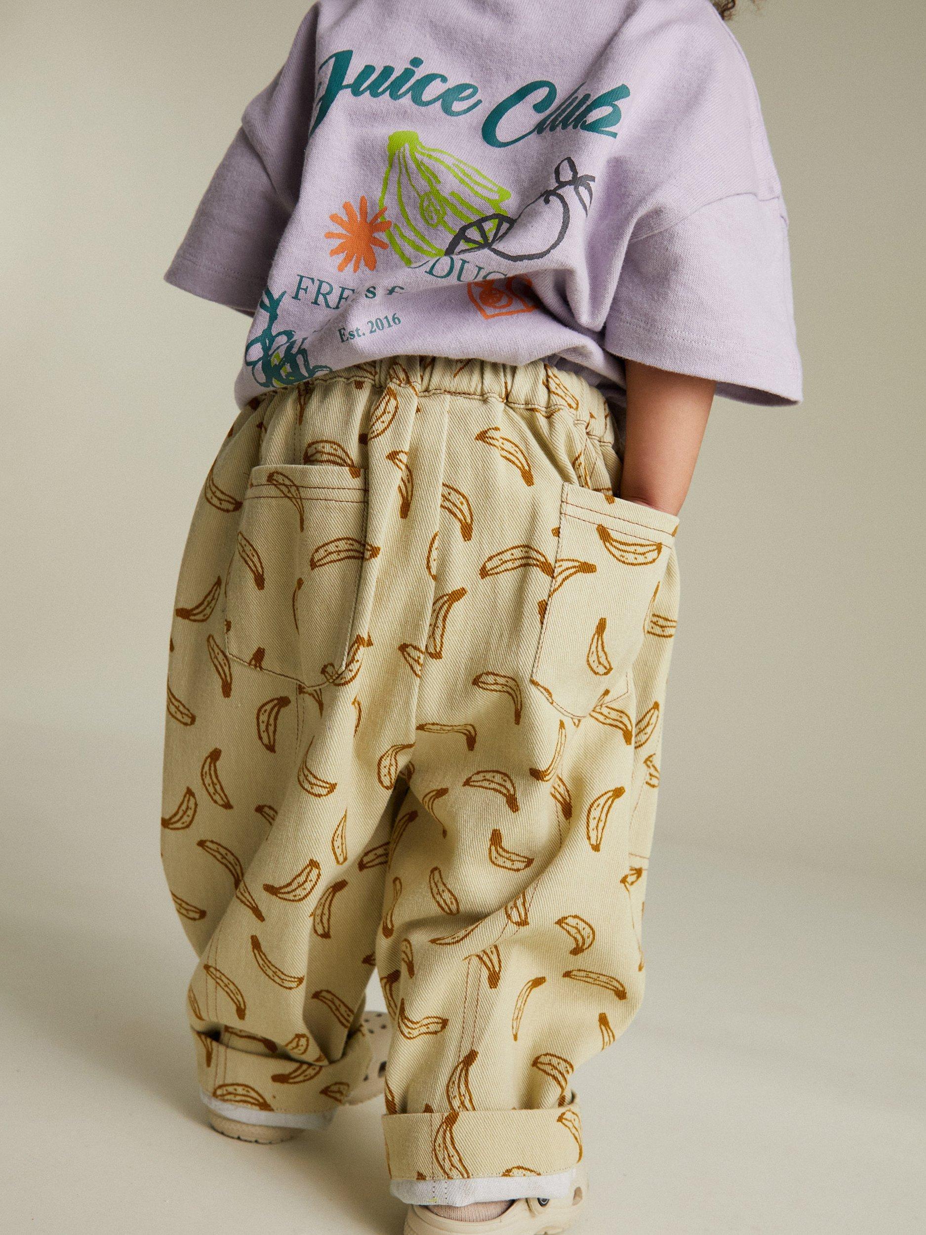 Product image 2 of 5, which shows Claude & Co Kids' Rian Cotton Banana Trousers, Off-white, 3-6 months