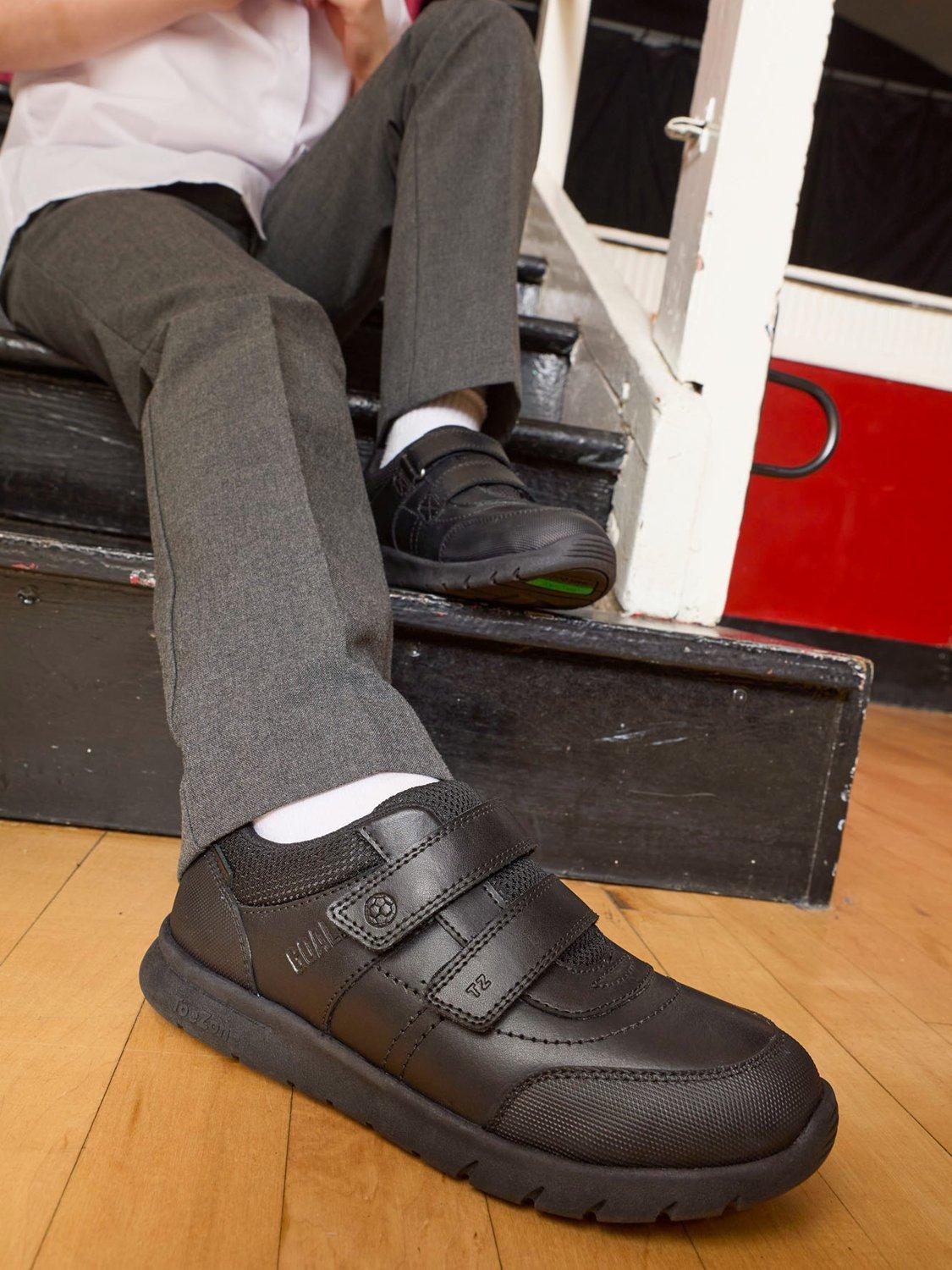 Product image 2 of 8, which shows ToeZone Kids' Strike Leather Football School Shoes, Black Black, 8 Jnr