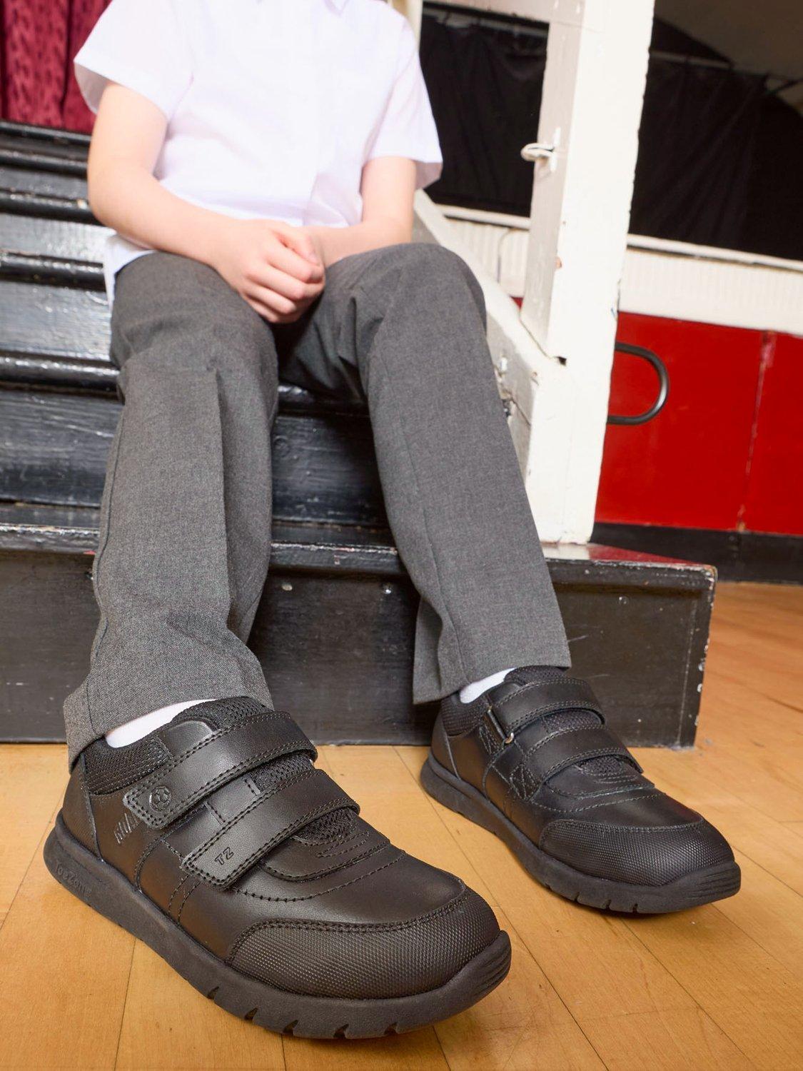 Product image 3 of 8, which shows ToeZone Kids' Strike Leather Football School Shoes, Black Black, 8 Jnr