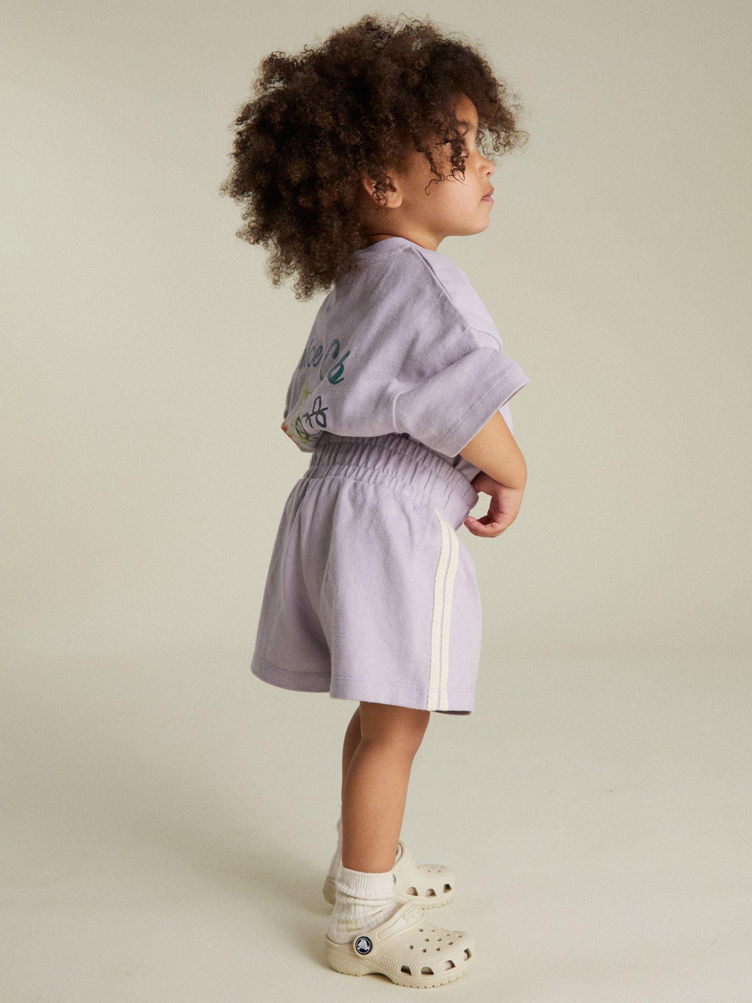 Product image 4 of 5, which shows Claude & Co Kids' Emmi Cotton Striped Shorts, Lilac, 6-12 months