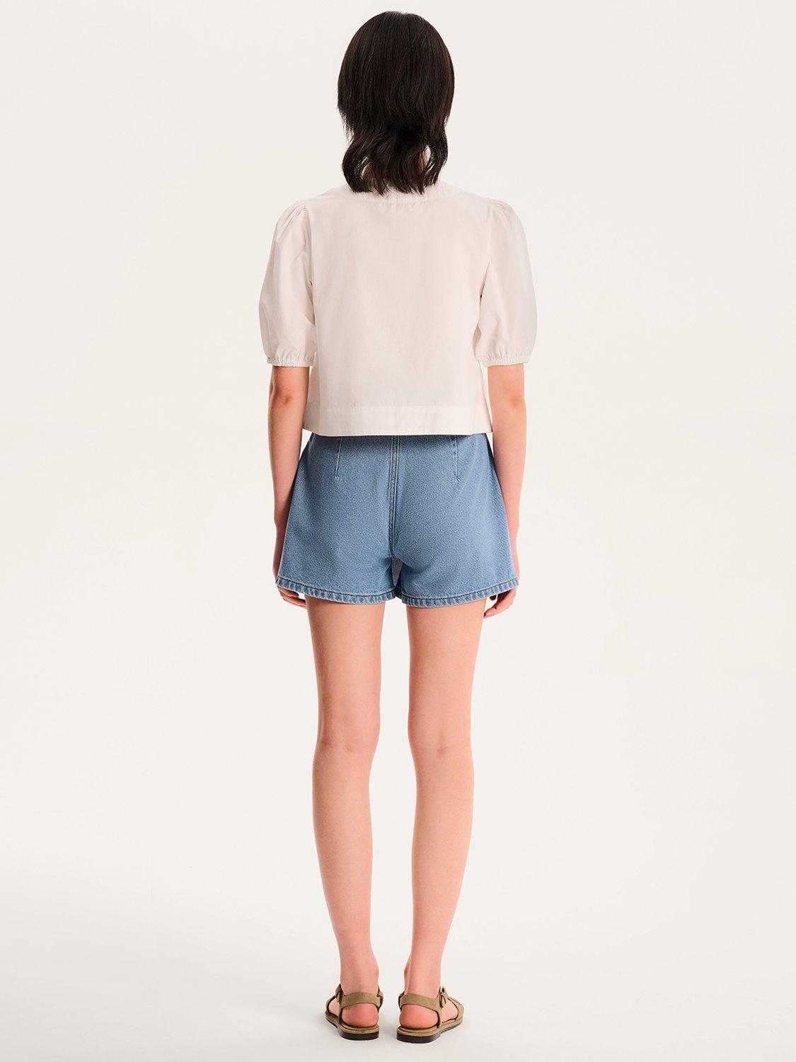 Product image 3 of 5, which shows OMNES Parker Denim Mini Skort, Blue, 10