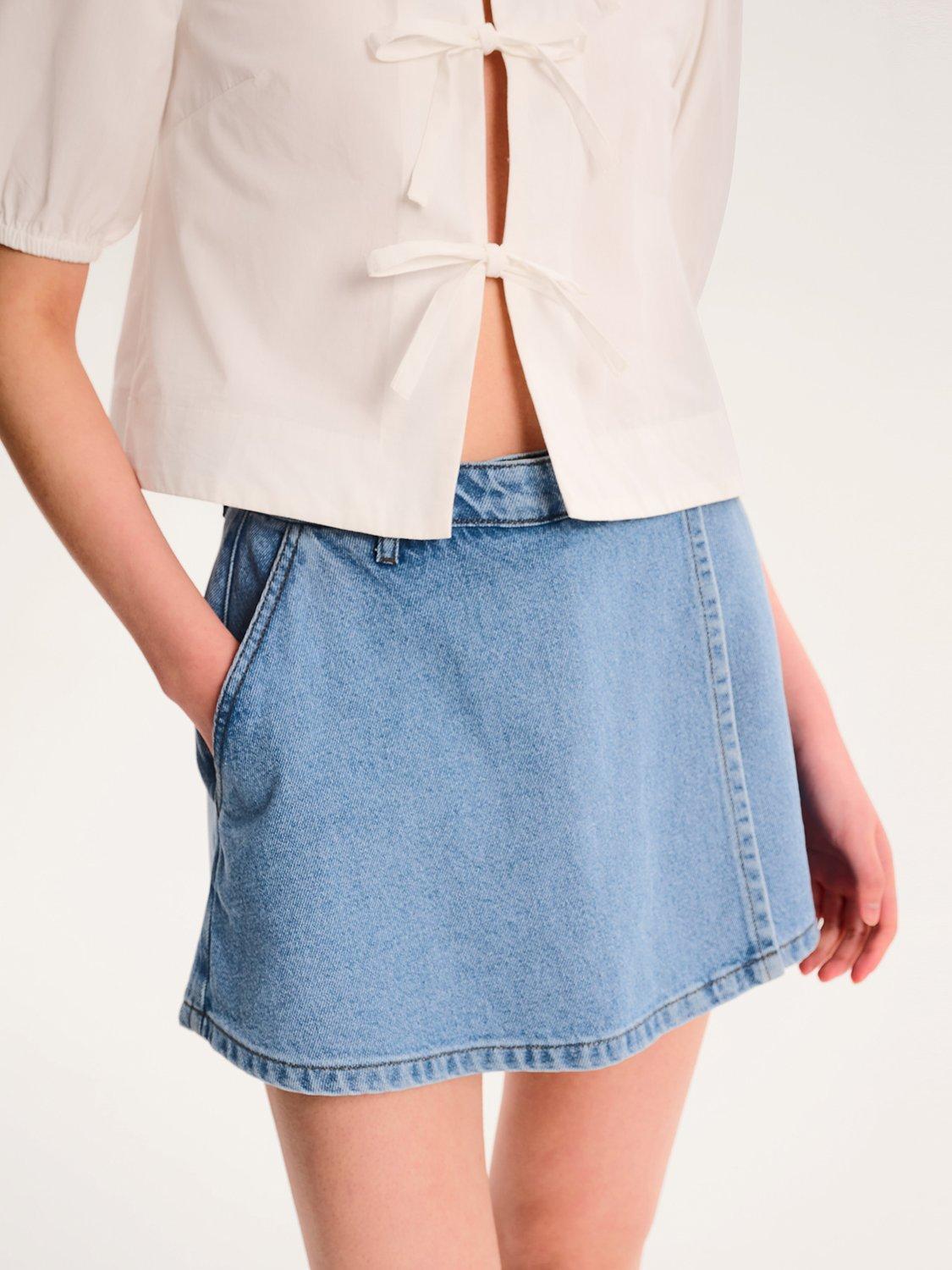 Product image 4 of 5, which shows OMNES Parker Denim Mini Skort, Blue, 10