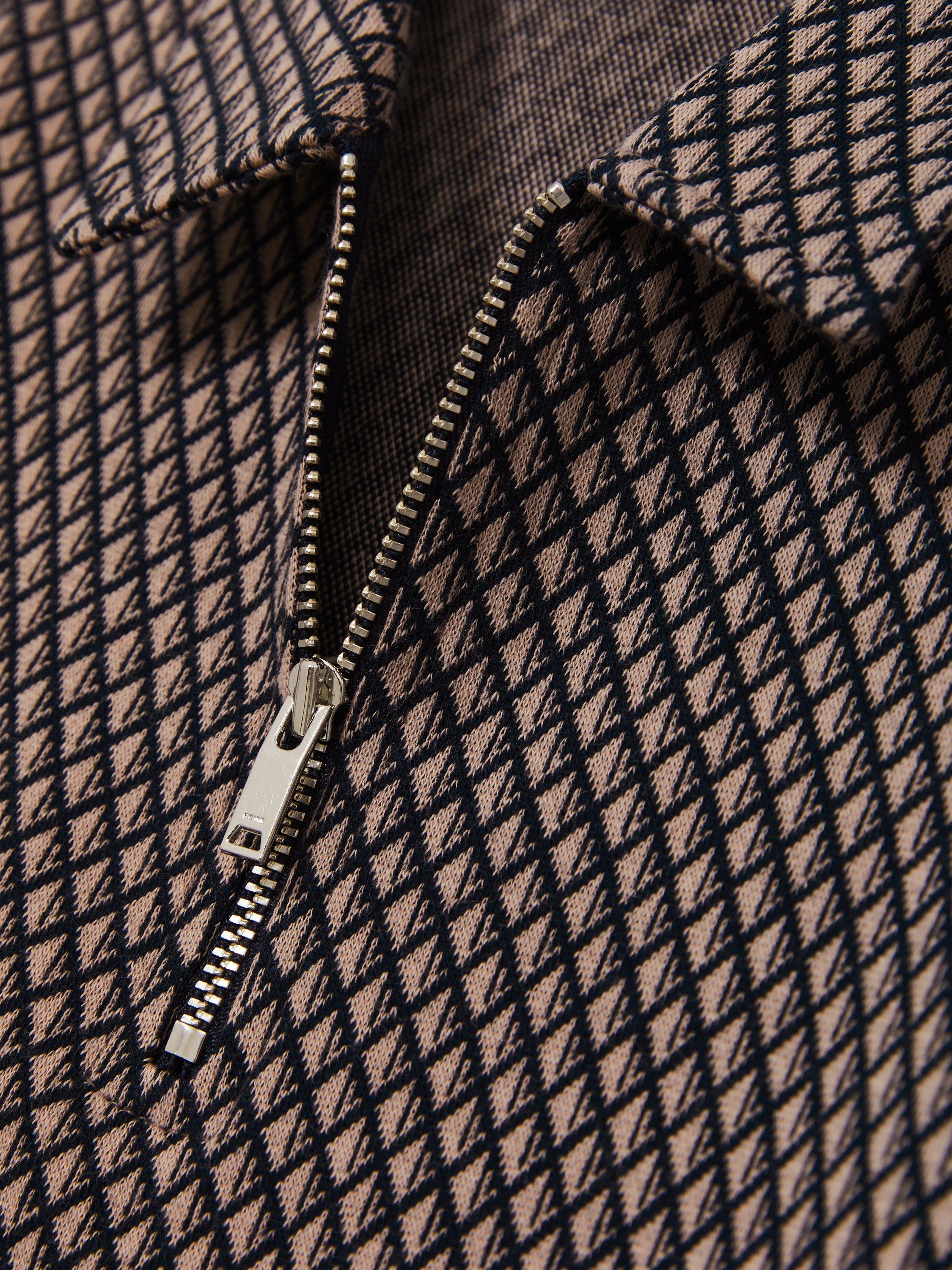 Product image 4 of 4, which shows Reiss Kids' Baines Geometric Quarter Zip Polo Shirt, Tobacco Brown/Navy, 4-5 years