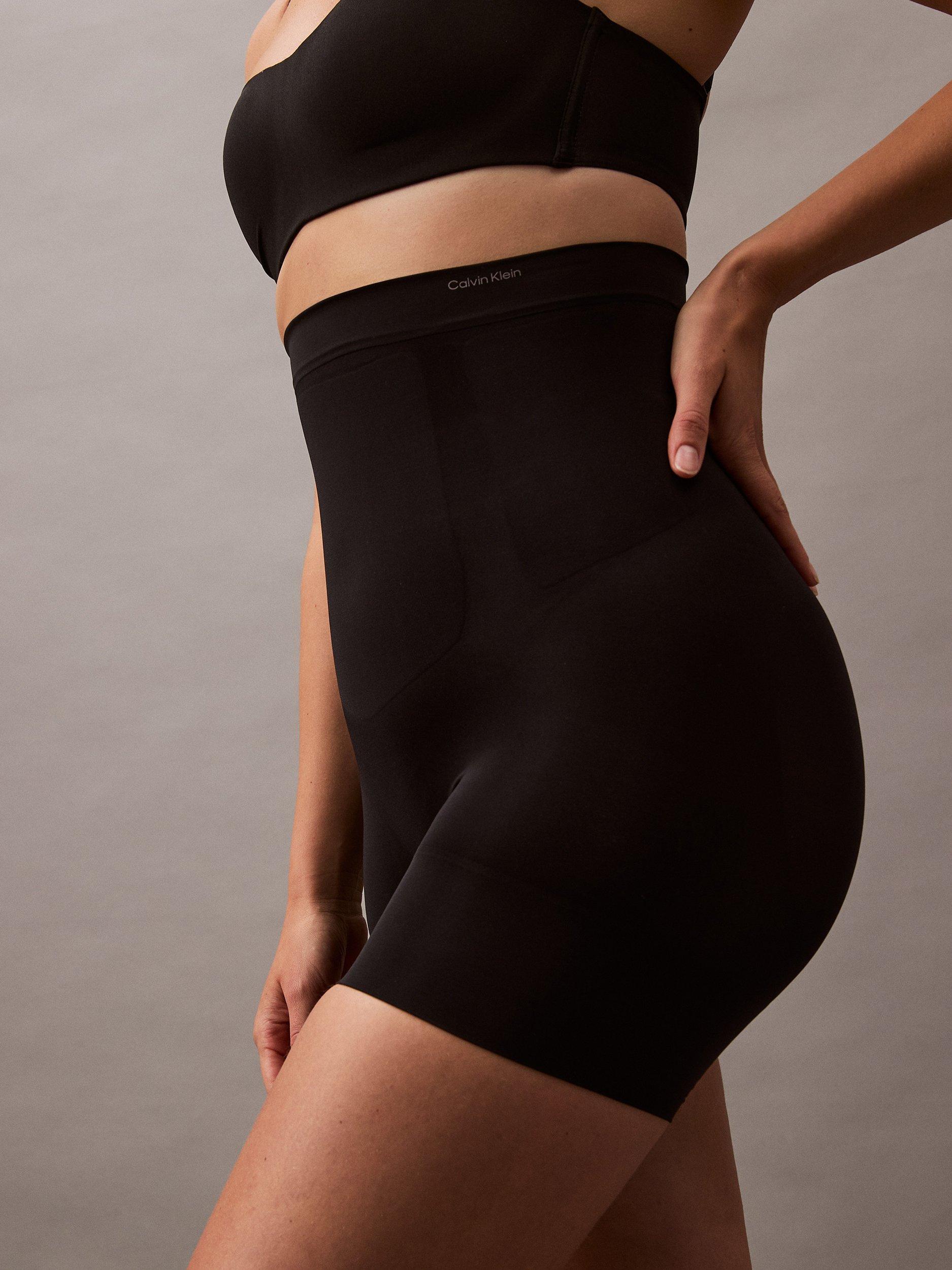 Product image 6 of 8, which shows Calvin Klein Secure Sculpt High-Waist Mid-Thigh Shapewear Shorts, Black, S