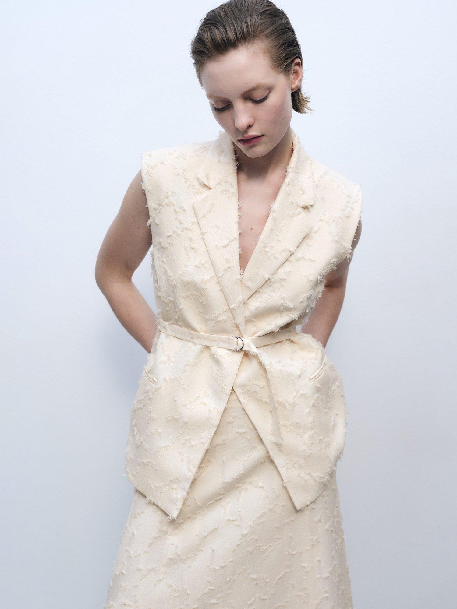 Product image 1 of 8, which shows Mango Floc Textured Waistcoat, Cream, S