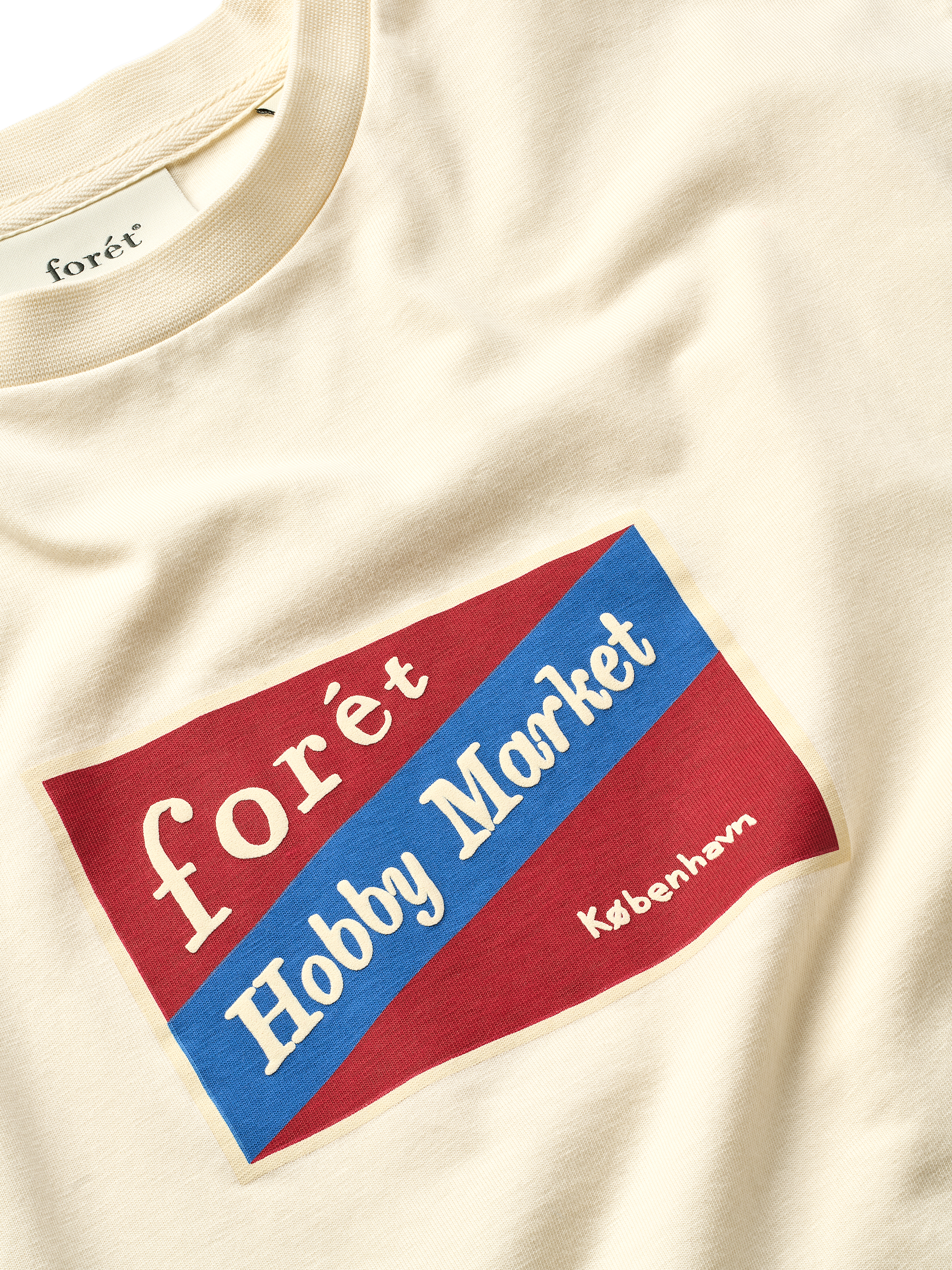 Product image 2 of 4, which shows forét Hobby T-Shirt, Cloud, M
