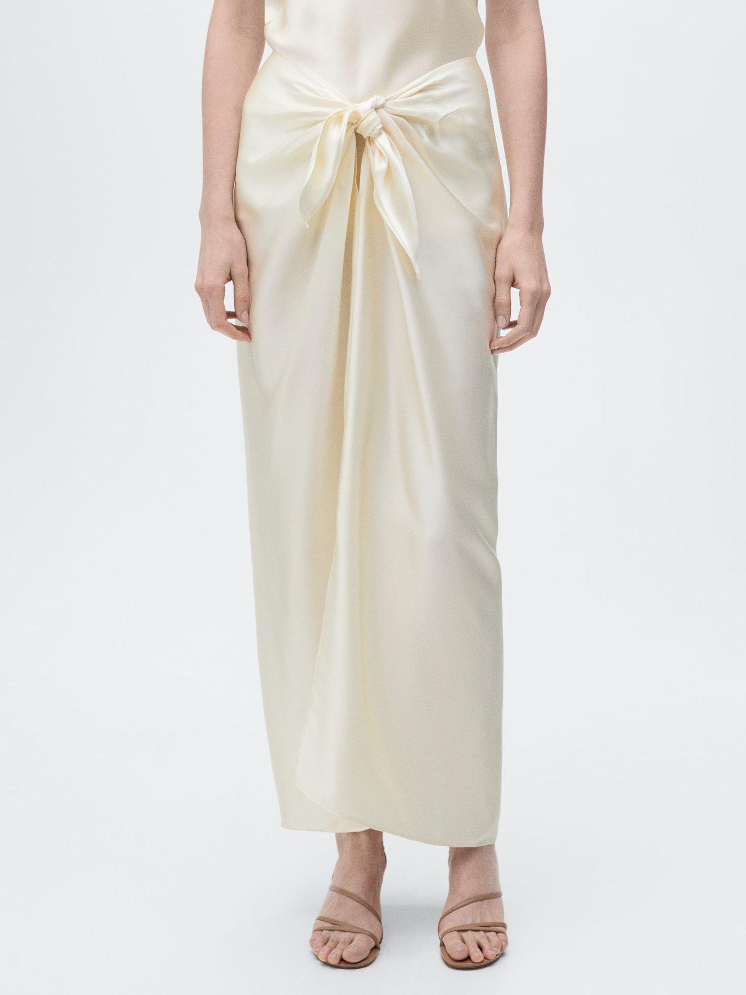Product image 1 of 8, which shows Mango Goldi Satin Knot Tie Maxi Skirt, Light Beige, S